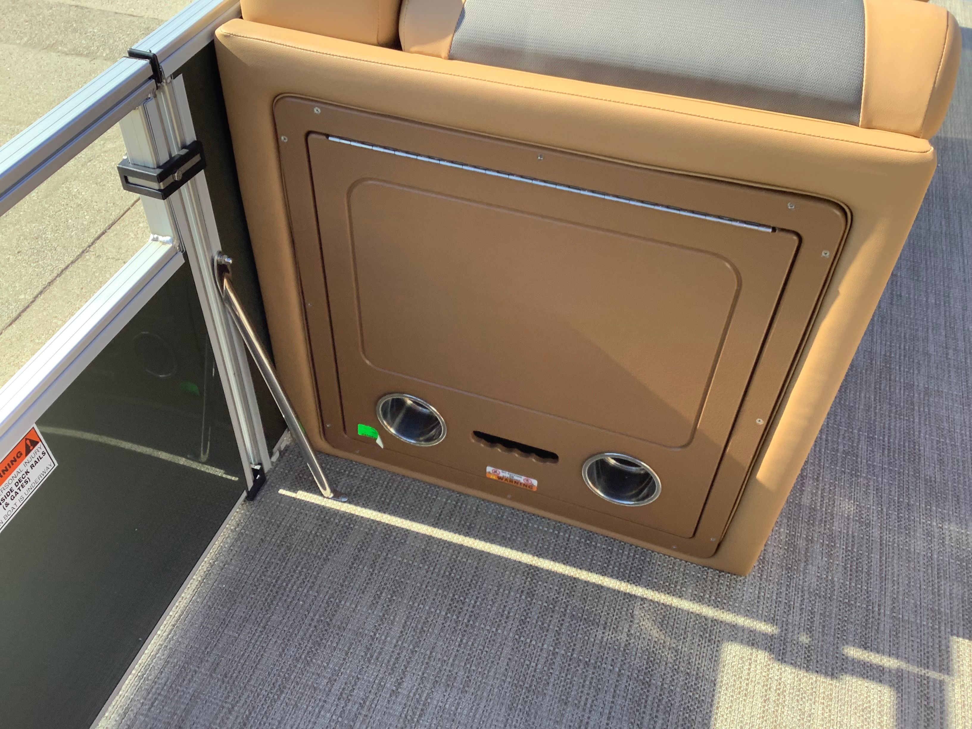 Interior of Landau 21 Island Breeze 2026 with brown upholstery.