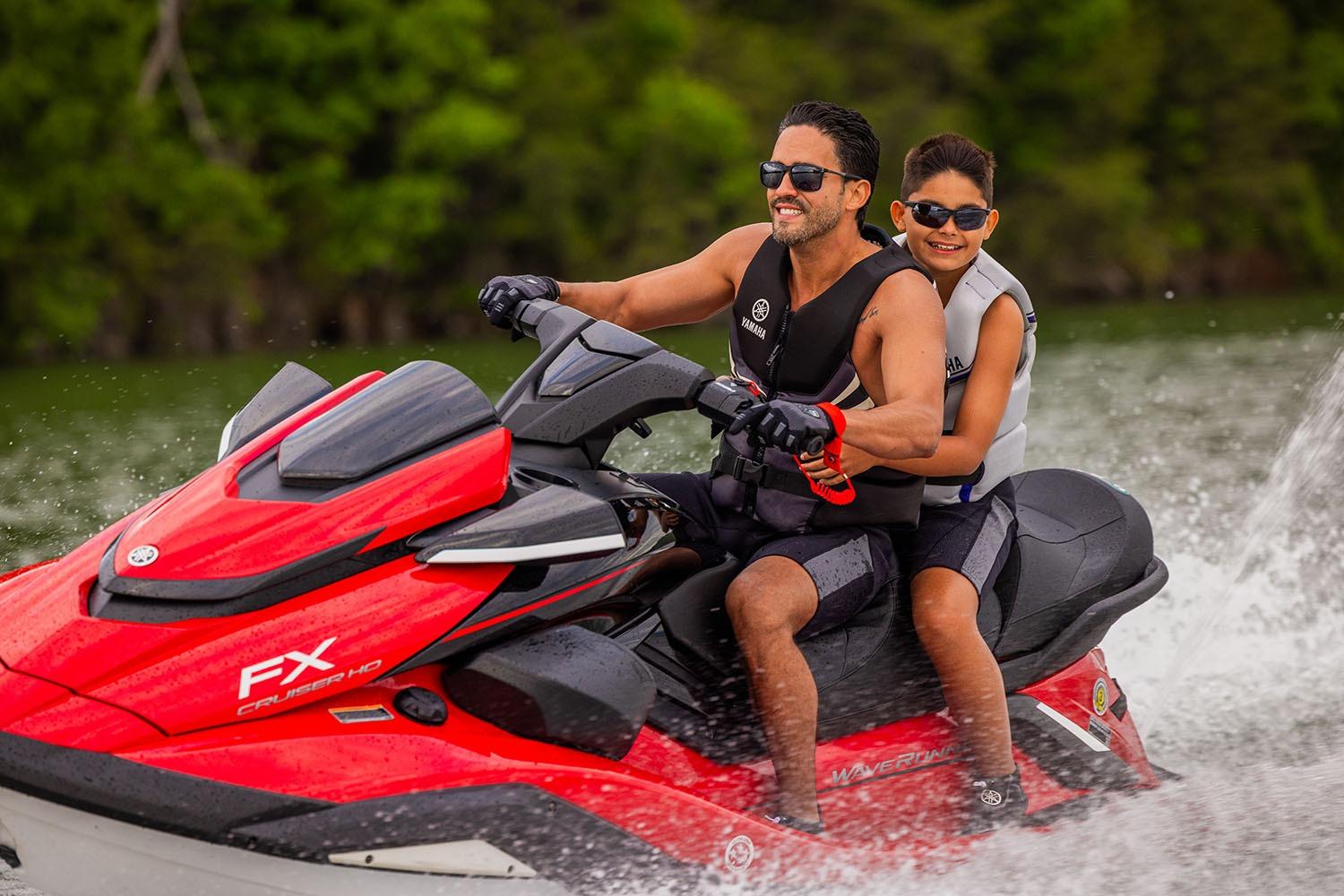 Manufacturer Provided Image: Father and son enjoying a ride on a 2026 Yamaha WaveRunner FX Cruiser HO.