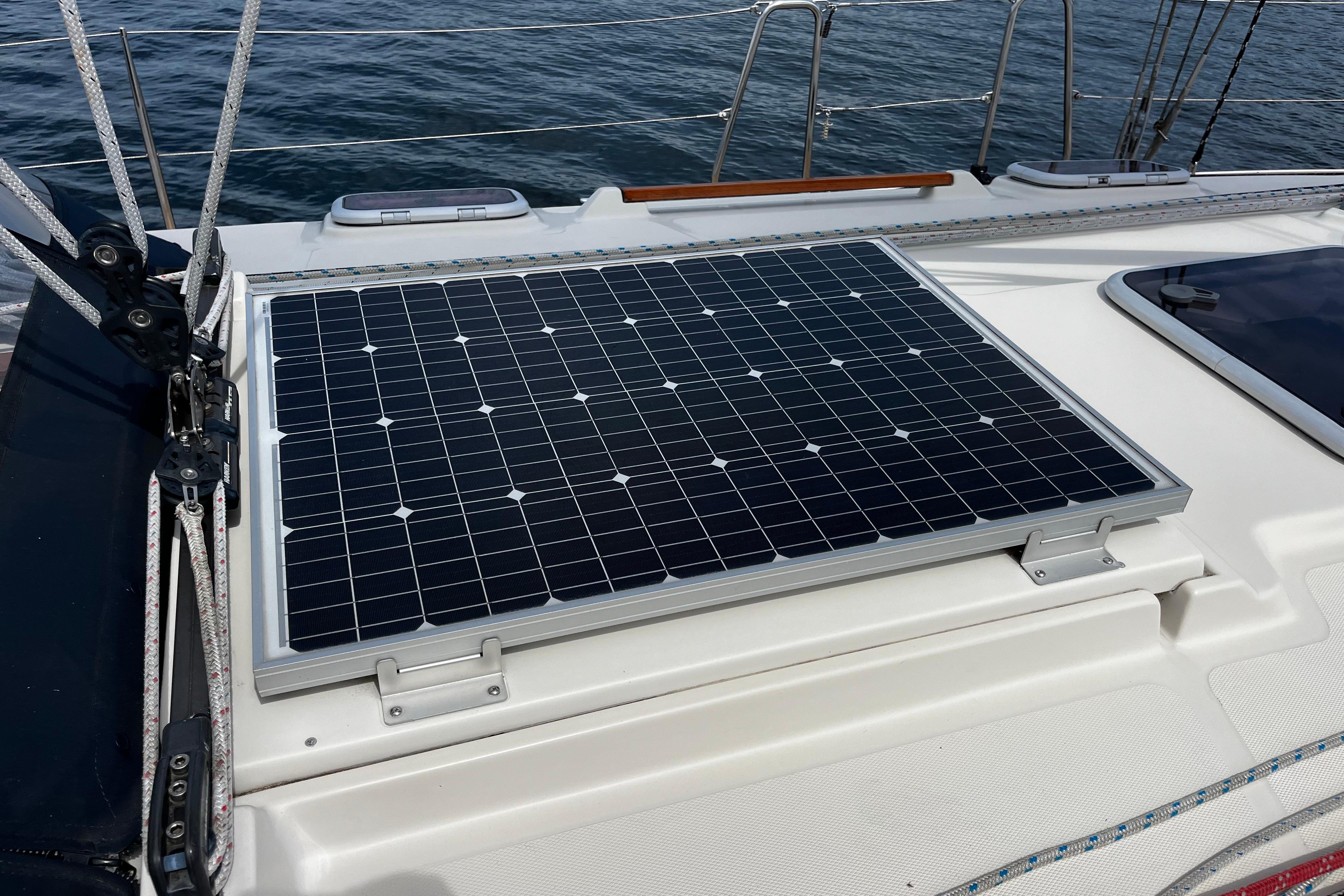 Solar panel on 2004 Hanse 411 yacht deck, enhancing energy efficiency at sea.