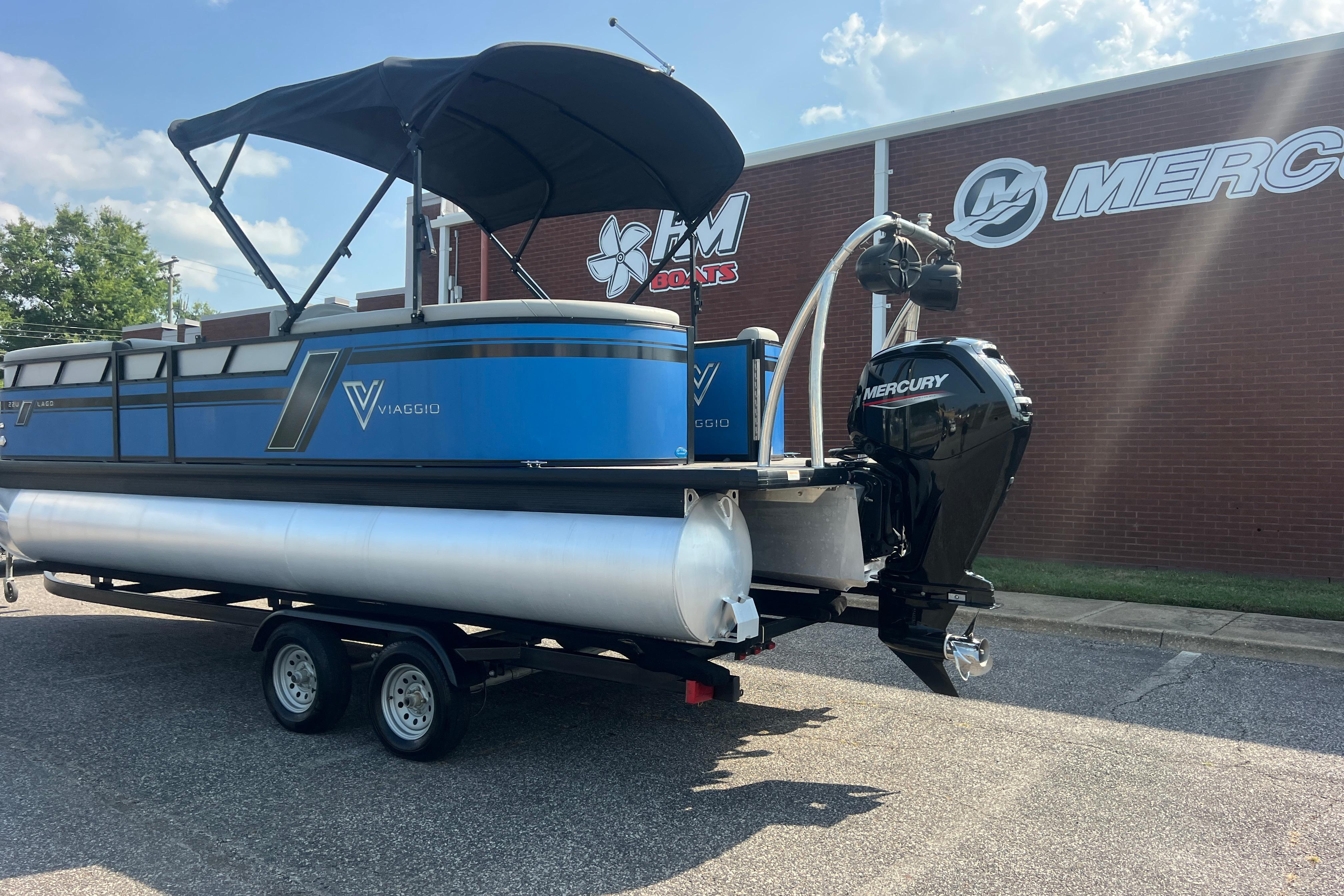 2022 Viaggio Lago V-U 22 pontoon boat with Mercury engine on trailer.