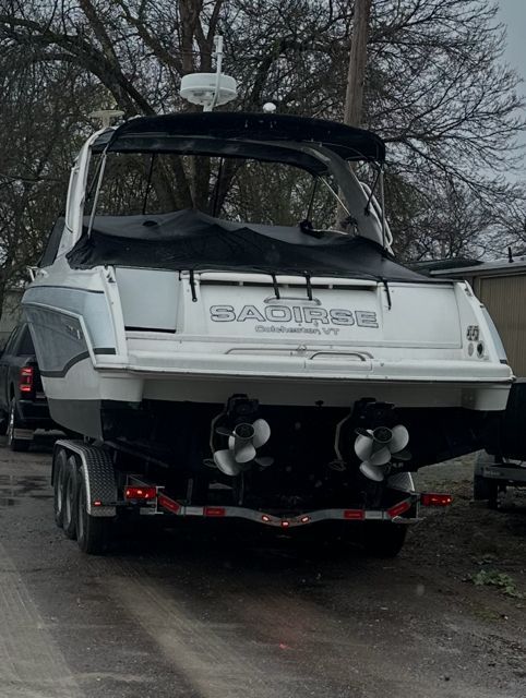 2006 Formula 330 Sun Sport boat on trailer, rear view.