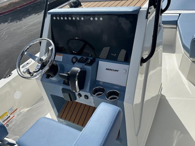 2025 Ranger 2360 Bay boat console with steering wheel and Mercury controls.