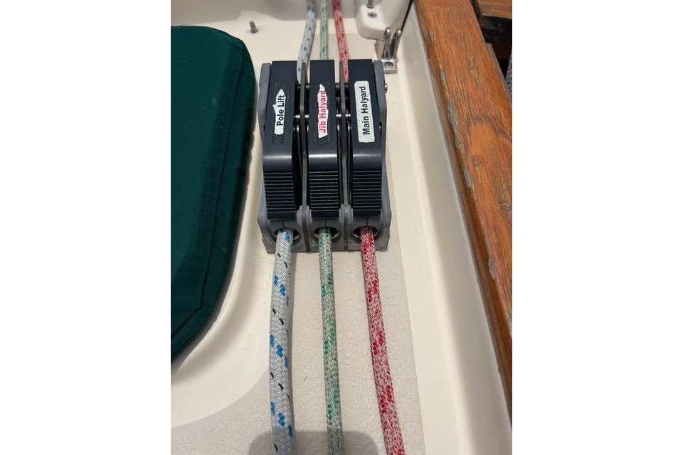 Sailing ropes and clutches on a 1991 Caliber 33 boat deck.