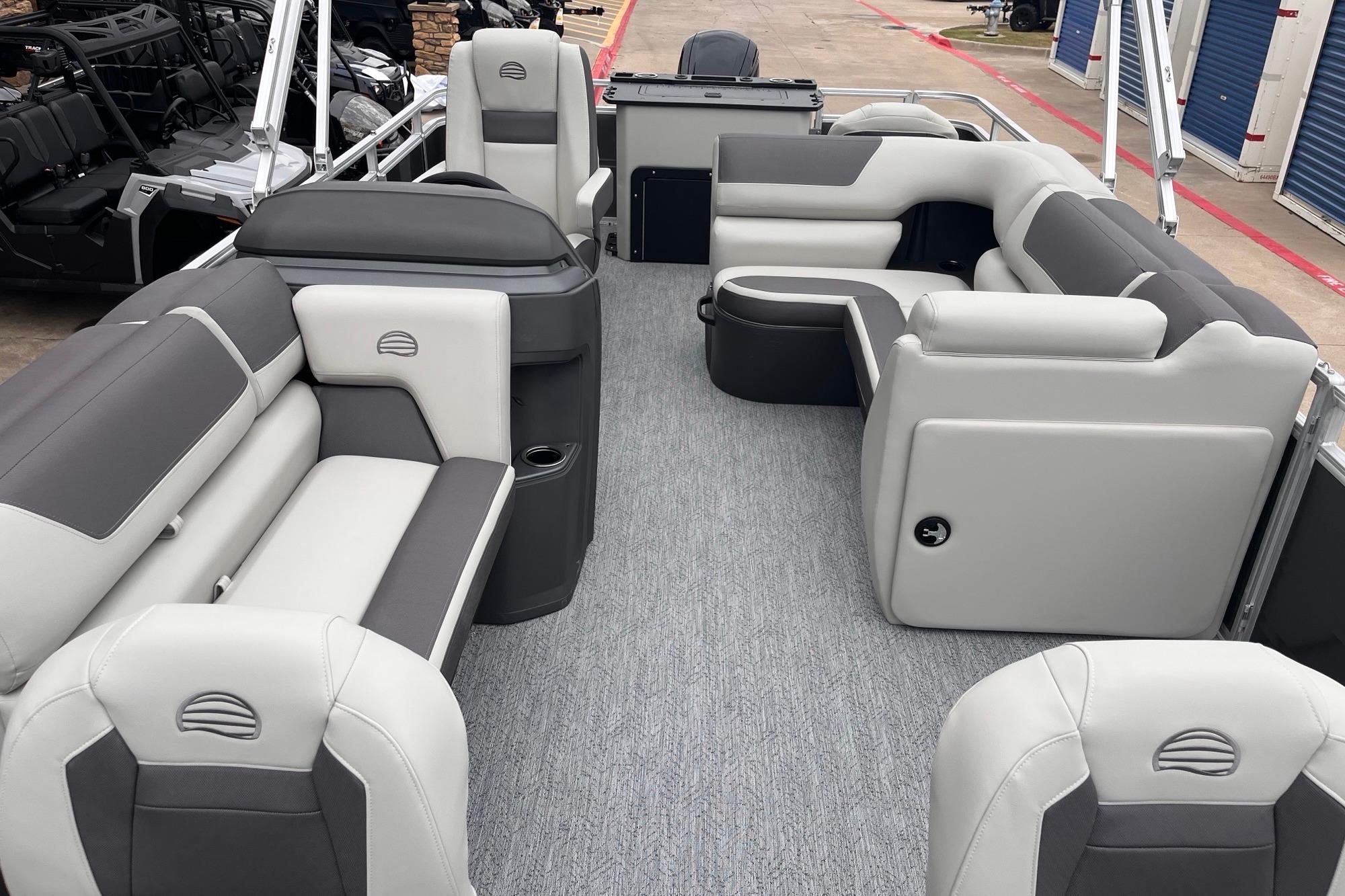 2026 Sun Tracker Fishin' Barge 20 DLX interior with spacious seating and modern design.