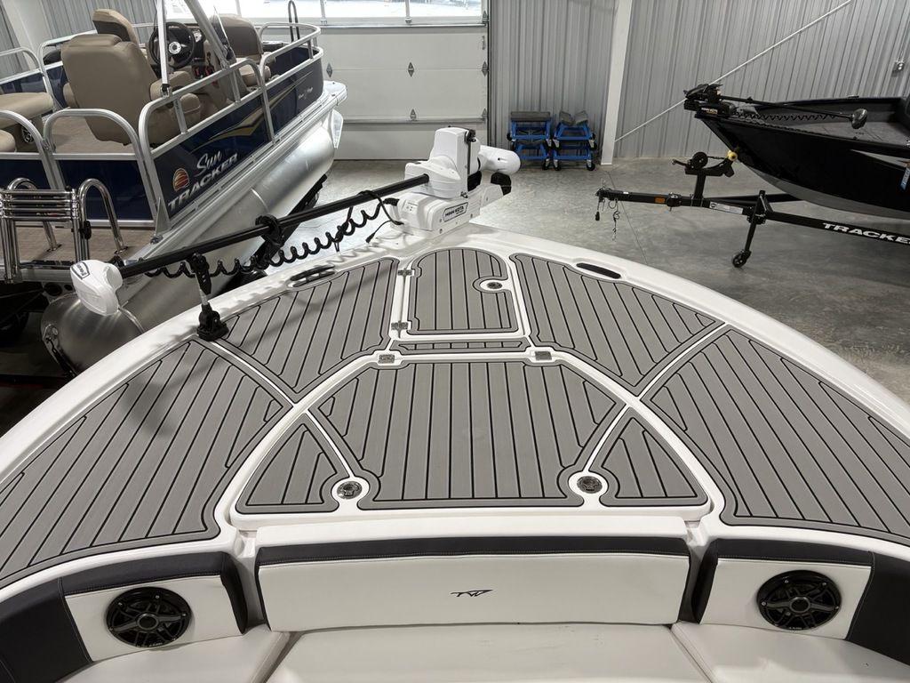 2026 Tidewater 2700 CB boat deck with gray non-slip surface in a showroom.