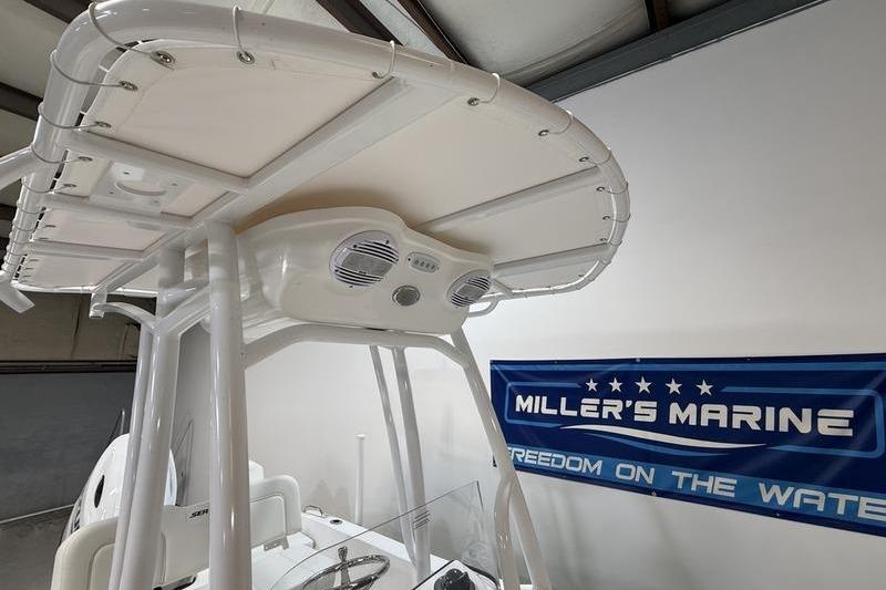 2026 Sea Pro 202 Center Console boat with T-top and speakers at Miller's Marine.