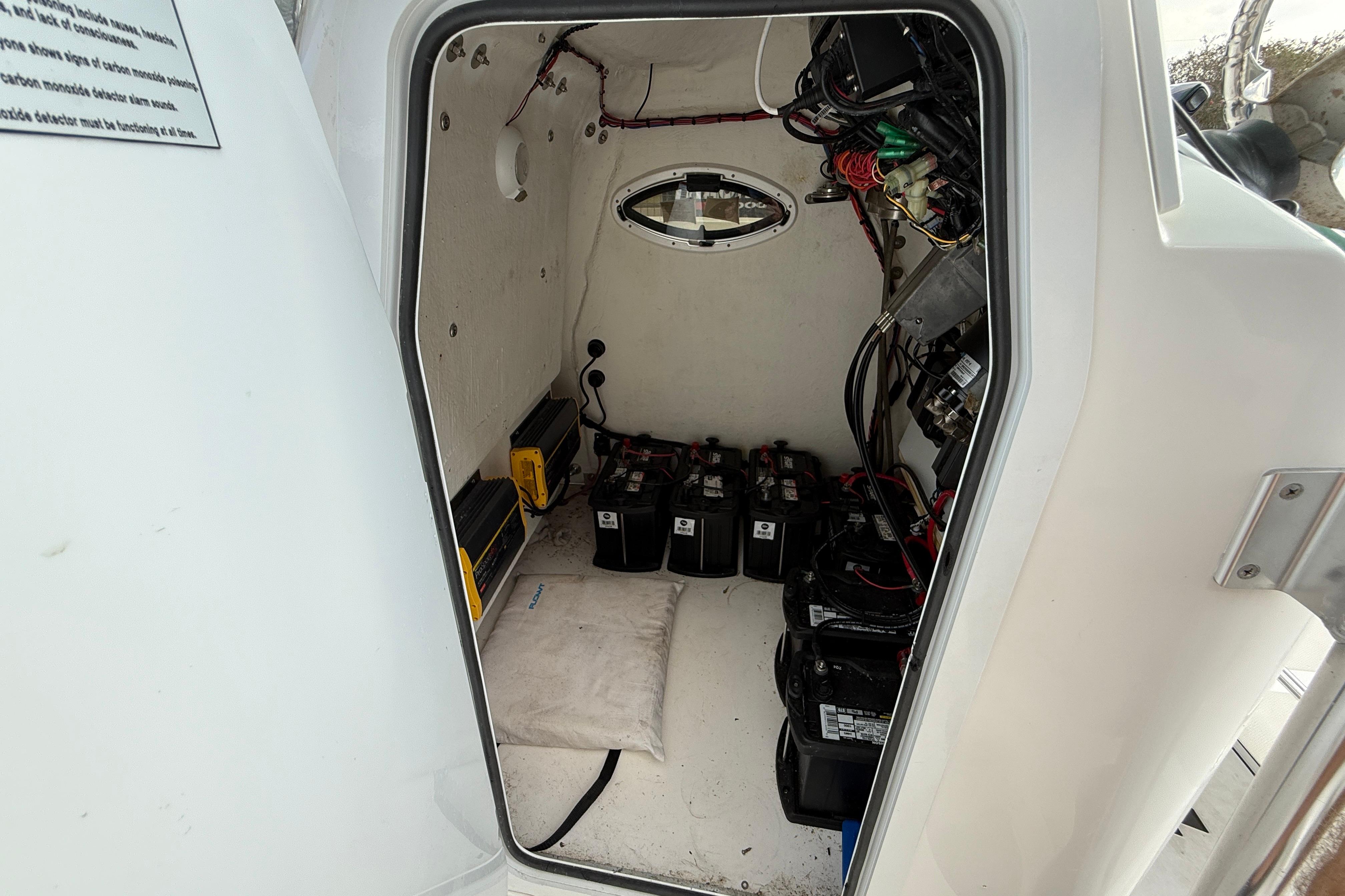 Interior view of 2020 Twin Vee 240 GFX CC boat's battery compartment.