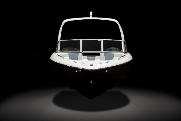 Manufacturer Provided Image: 2022 Chaparral 23 SSi boat front view in dark background.