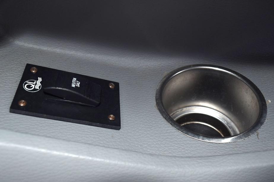 Boat control panel and cup holder in 2006 Cobalt 240.