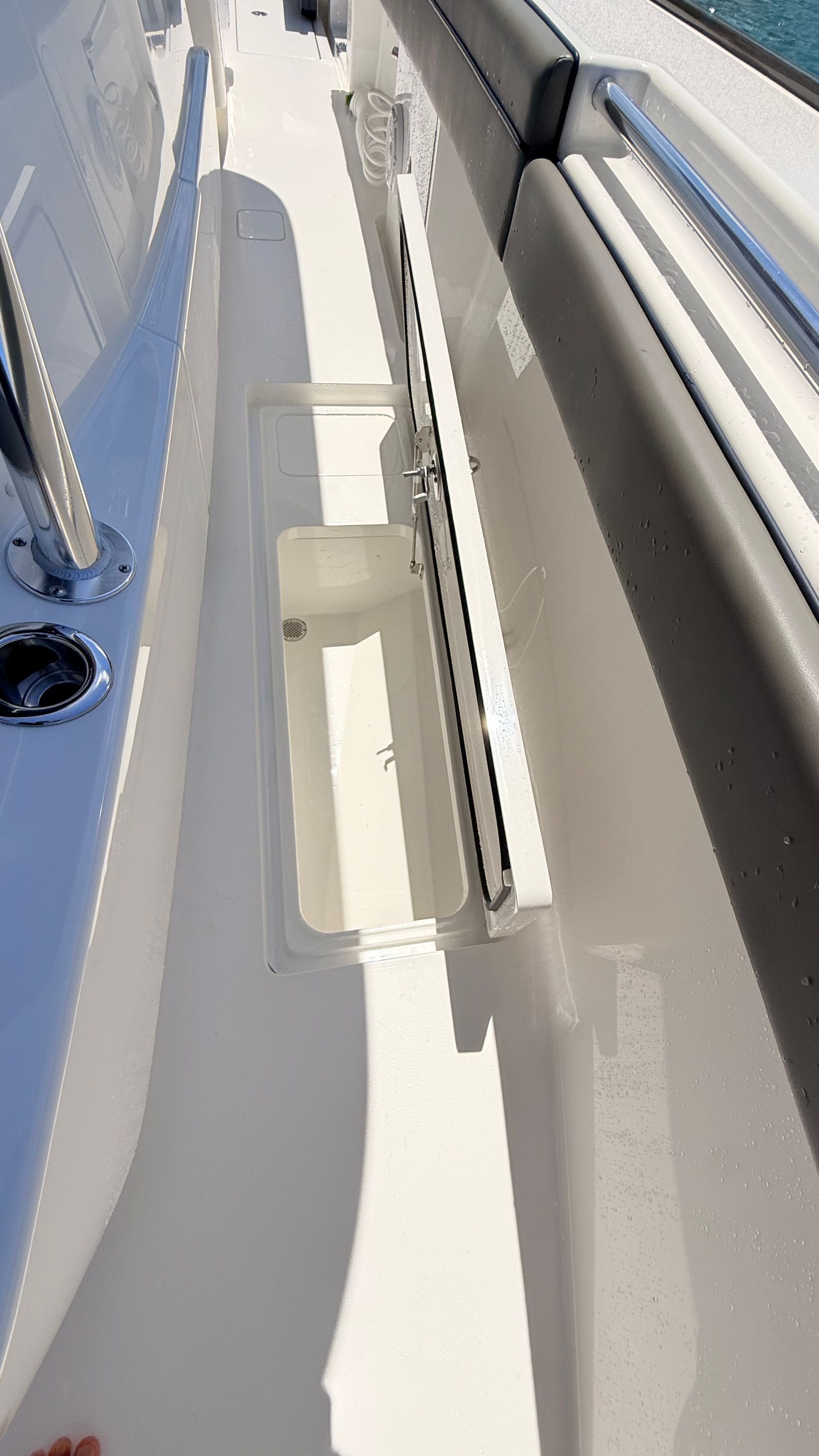 Valhalla Boatworks V33 2026 with open storage compartment on deck.