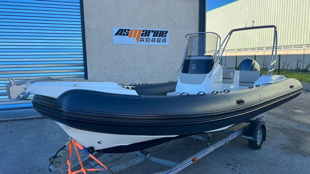 2023 Capelli Tempest 700 boat on trailer outside AS Marine facility.