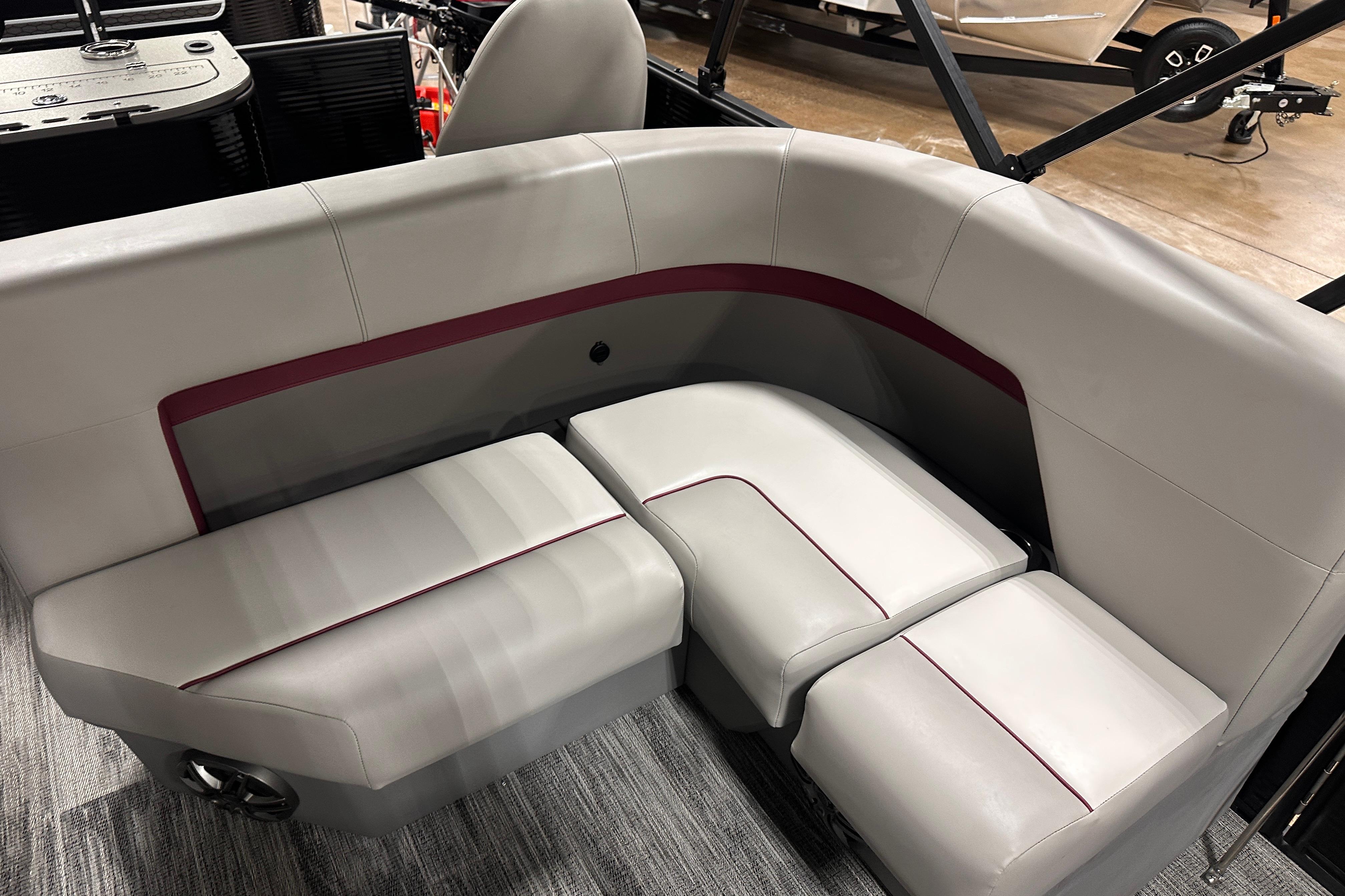 2025 Qwest 18 XRE Cruise boat interior with sleek, modern seating design.