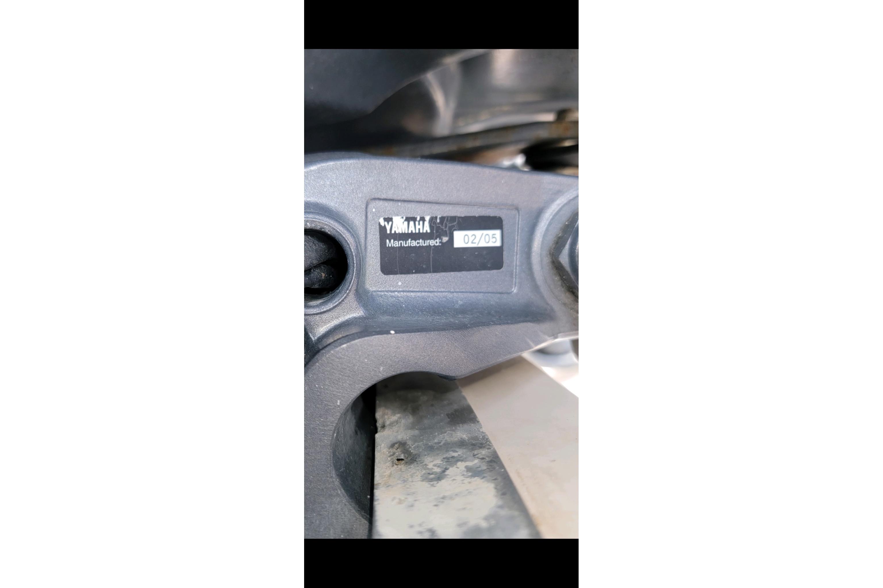 Yamaha engine part with manufacturing date label, February 2005, on Grady-White Chase 273 boat.