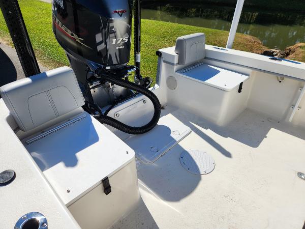 2023 May-Craft 208 CC boat interior with Yamaha 175 engine, seating, and storage.