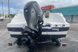 2021 Hurricane SunDeck Sport 192 RL OB boat, rear view with outboard motor.