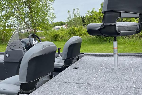 2025 Tracker Bass Tracker Classic XL boat interior with seating and steering wheel.