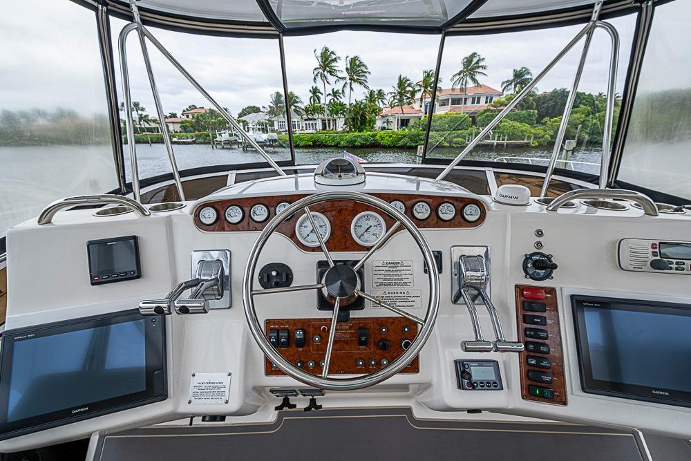 Cockpit view of 2000 Silverton 442 Cockpit Motor Yacht with navigation instruments.