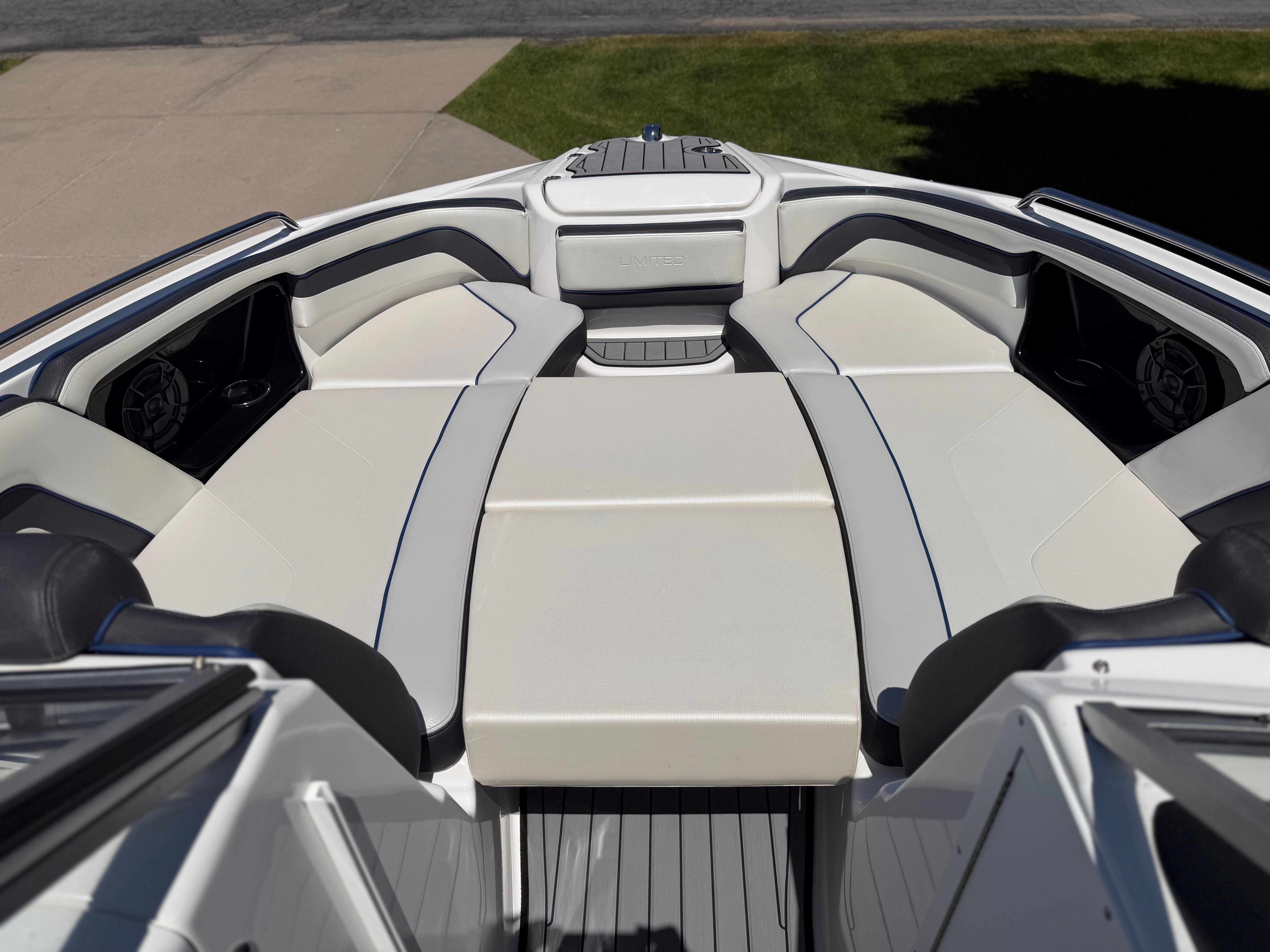 The image shows the bow area of a 2018 Yamaha 242 Limited S with white upholstery.