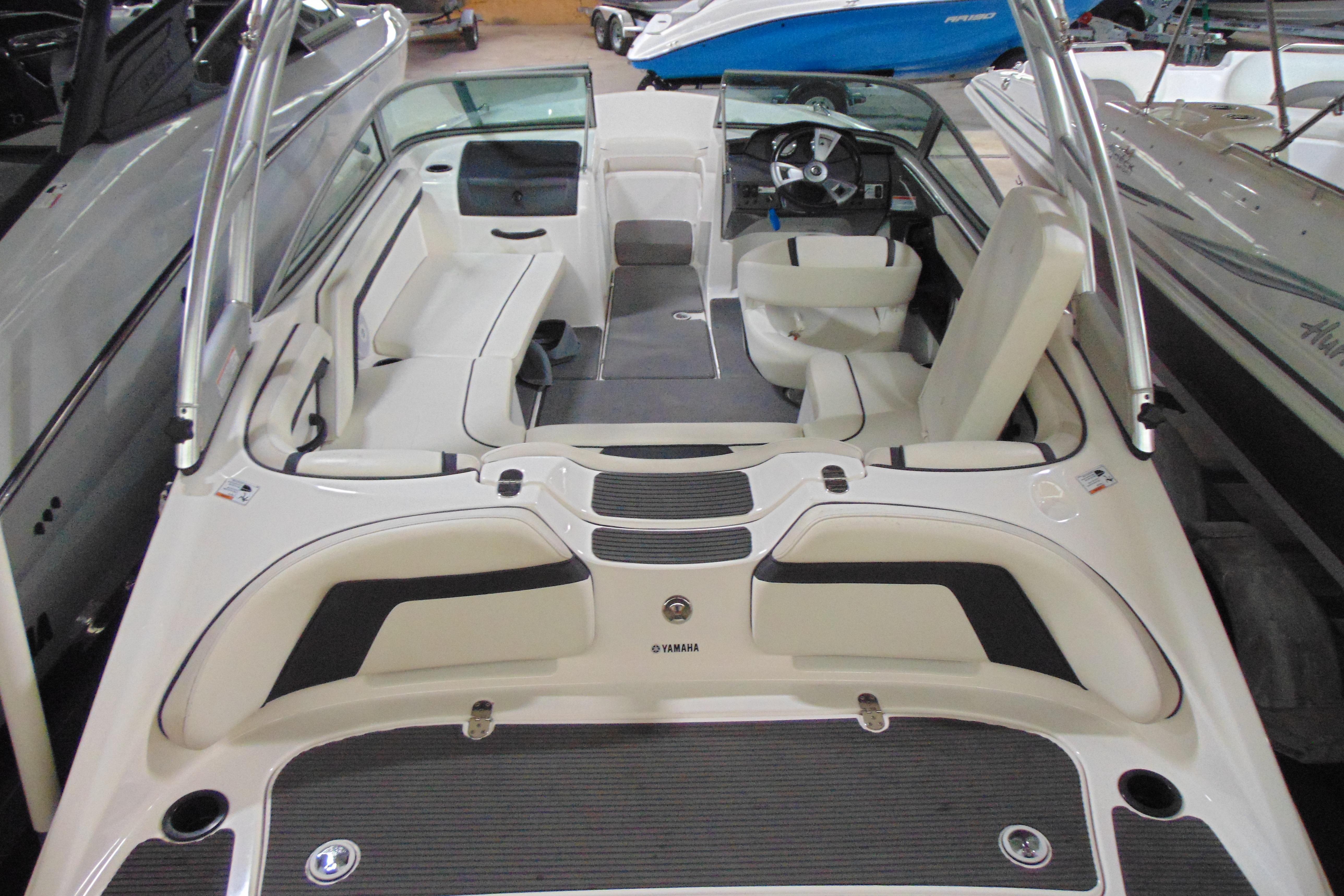 2016 Yamaha Boats AR190 interior view, showcasing seating and steering area.
