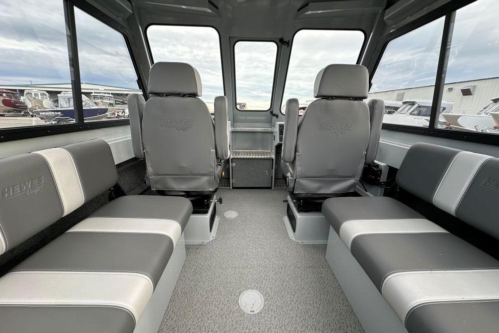 Interior of 2026 Hewescraft 190 Sea Runner Hardtop, featuring spacious seating and modern design.