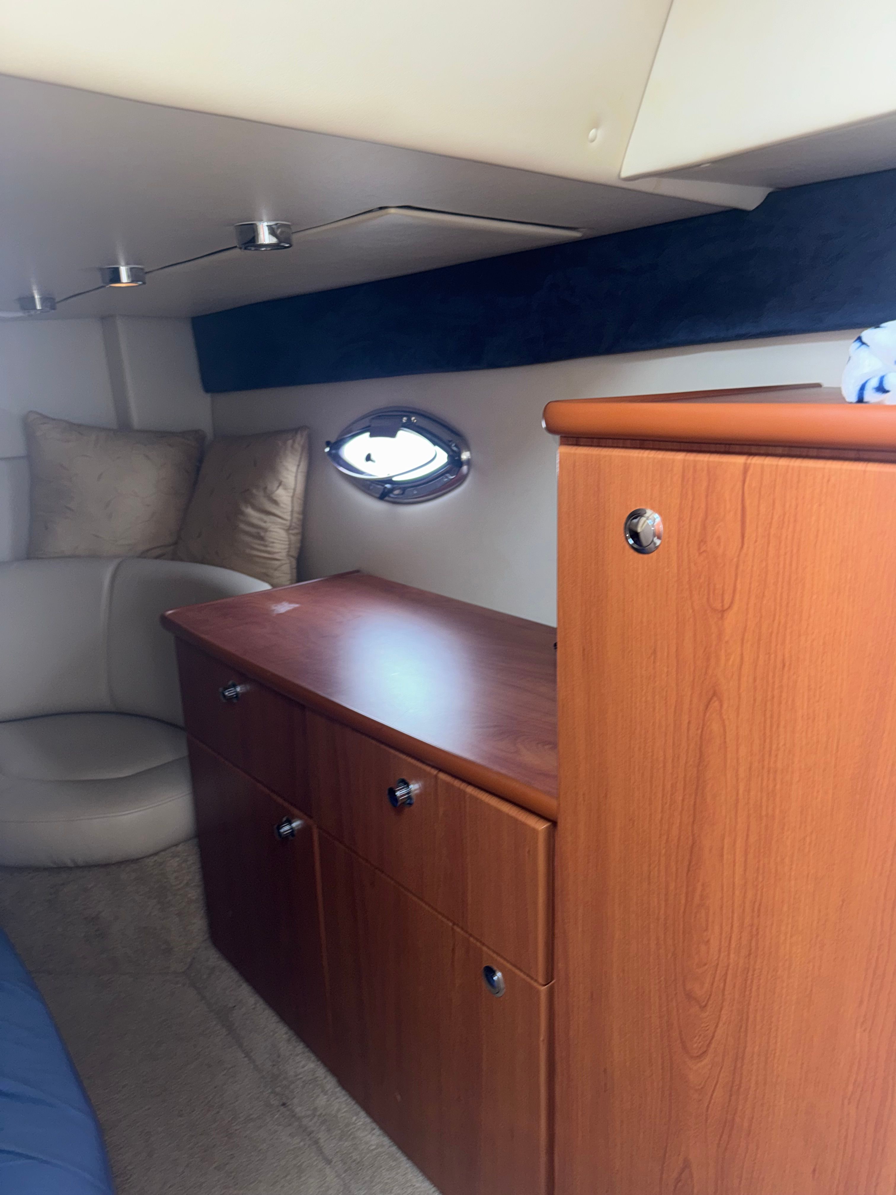 Interior of a 2008 Bayliner 340 yacht with wooden cabinetry.