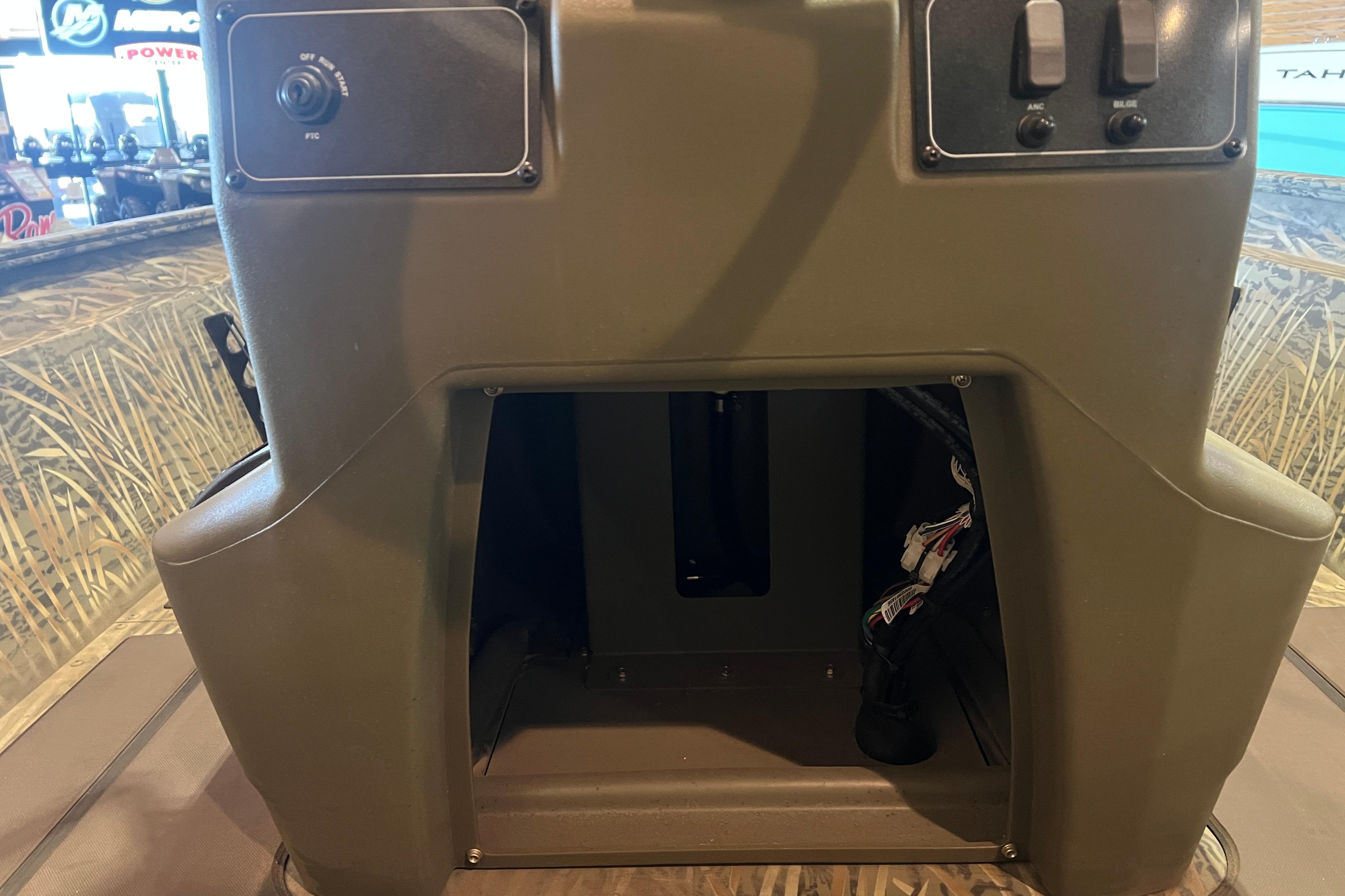 Control panel of 2026 Tracker Grizzly 1860 CC boat, featuring switches and wiring.