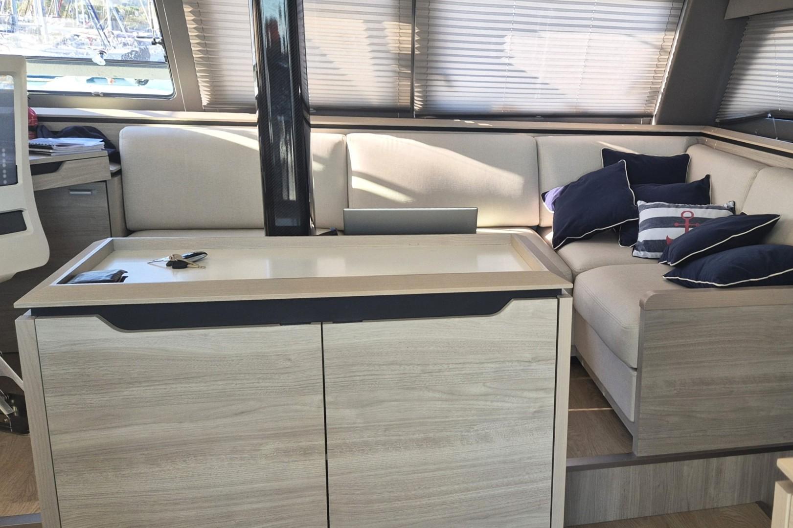 Luxurious interior of 2023 Catana Ocean Class yacht with modern seating and stylish decor.