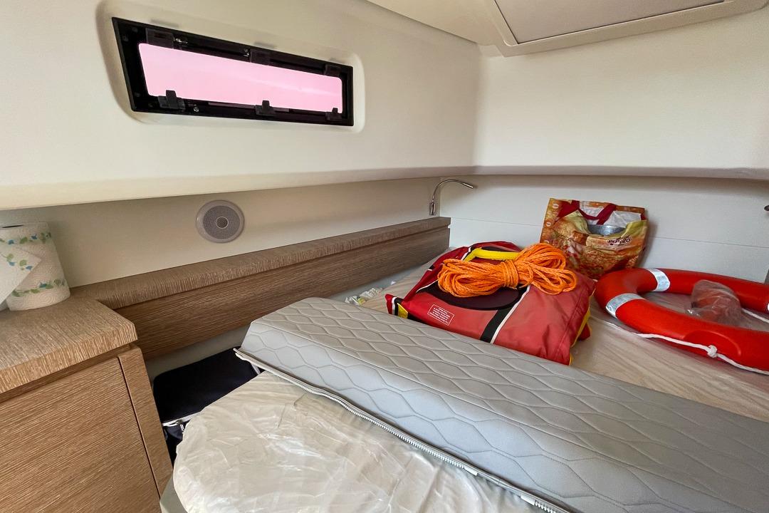 Interior cabin of 2022 Astondoa 377 Coupe with safety equipment and storage.