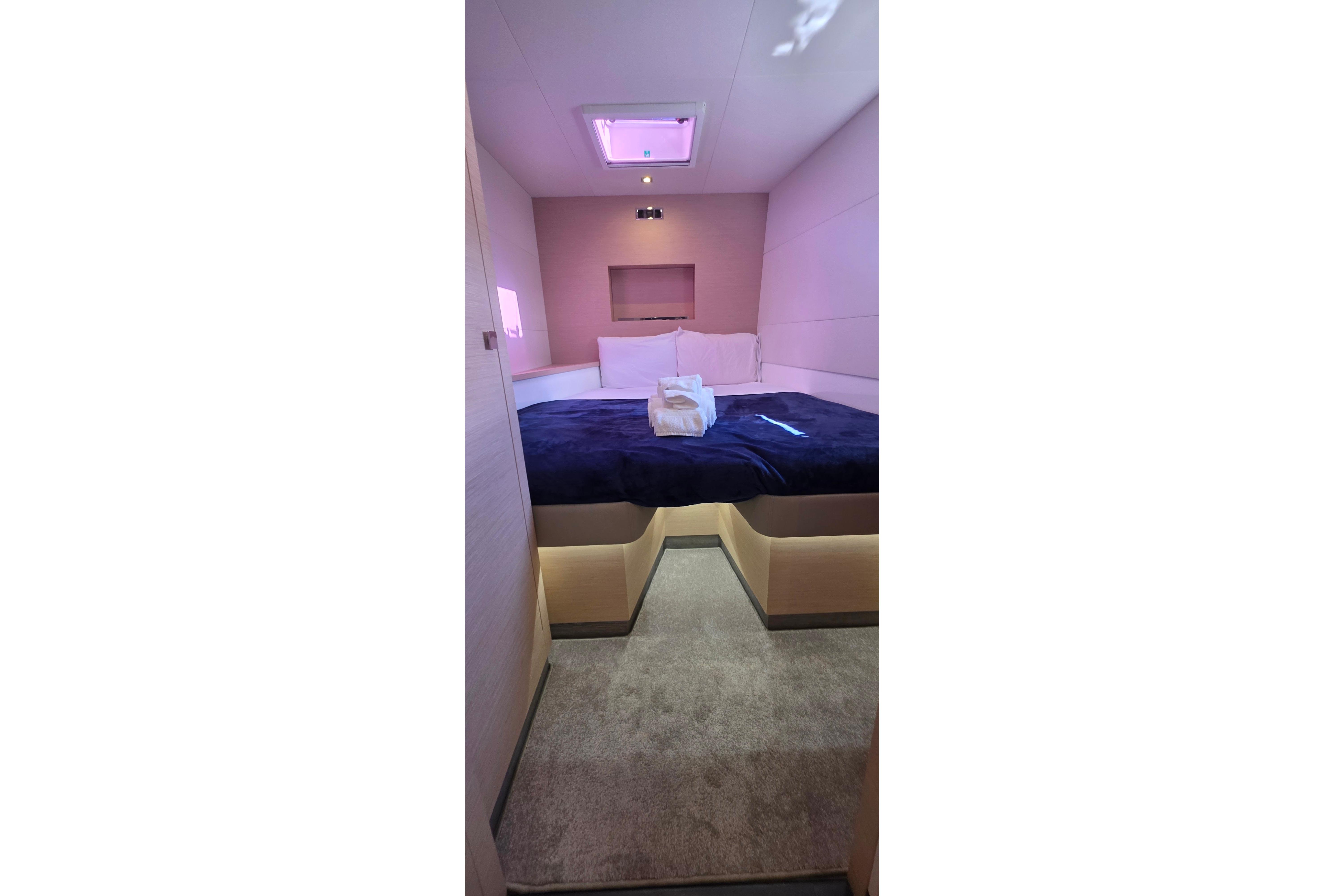 Luxurious bedroom interior of 2018 Fountaine Pajot Motor Yacht 44 with modern design.
