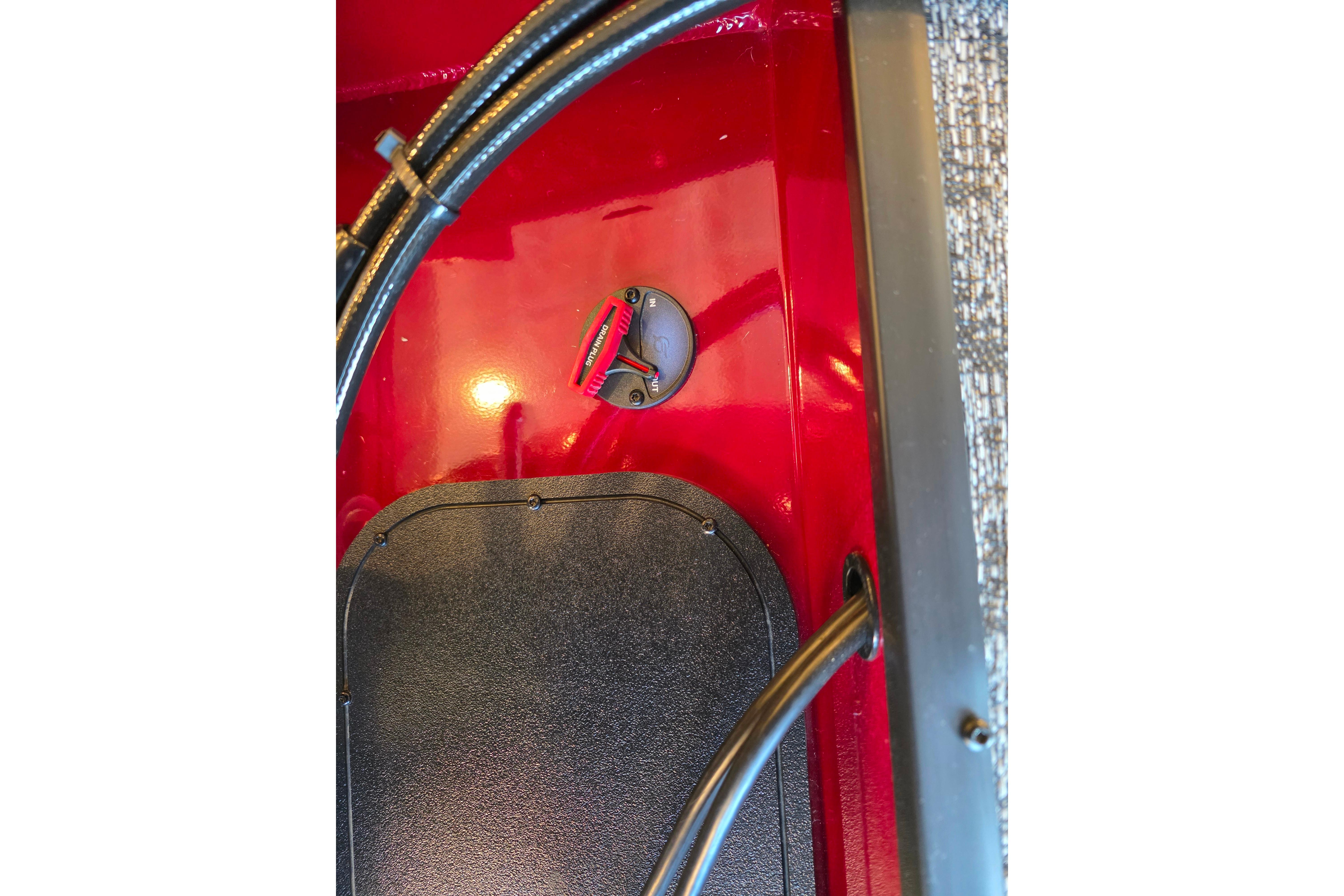 Red interior of 2026 Ranger VS1782SC Reata boat with wiring and control panel.