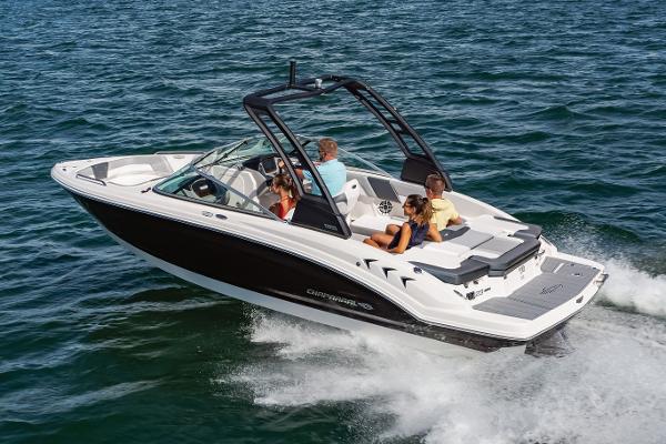 Manufacturer Provided Image: 2023 Chaparral 23 SSi boat cruising on open water with passengers.