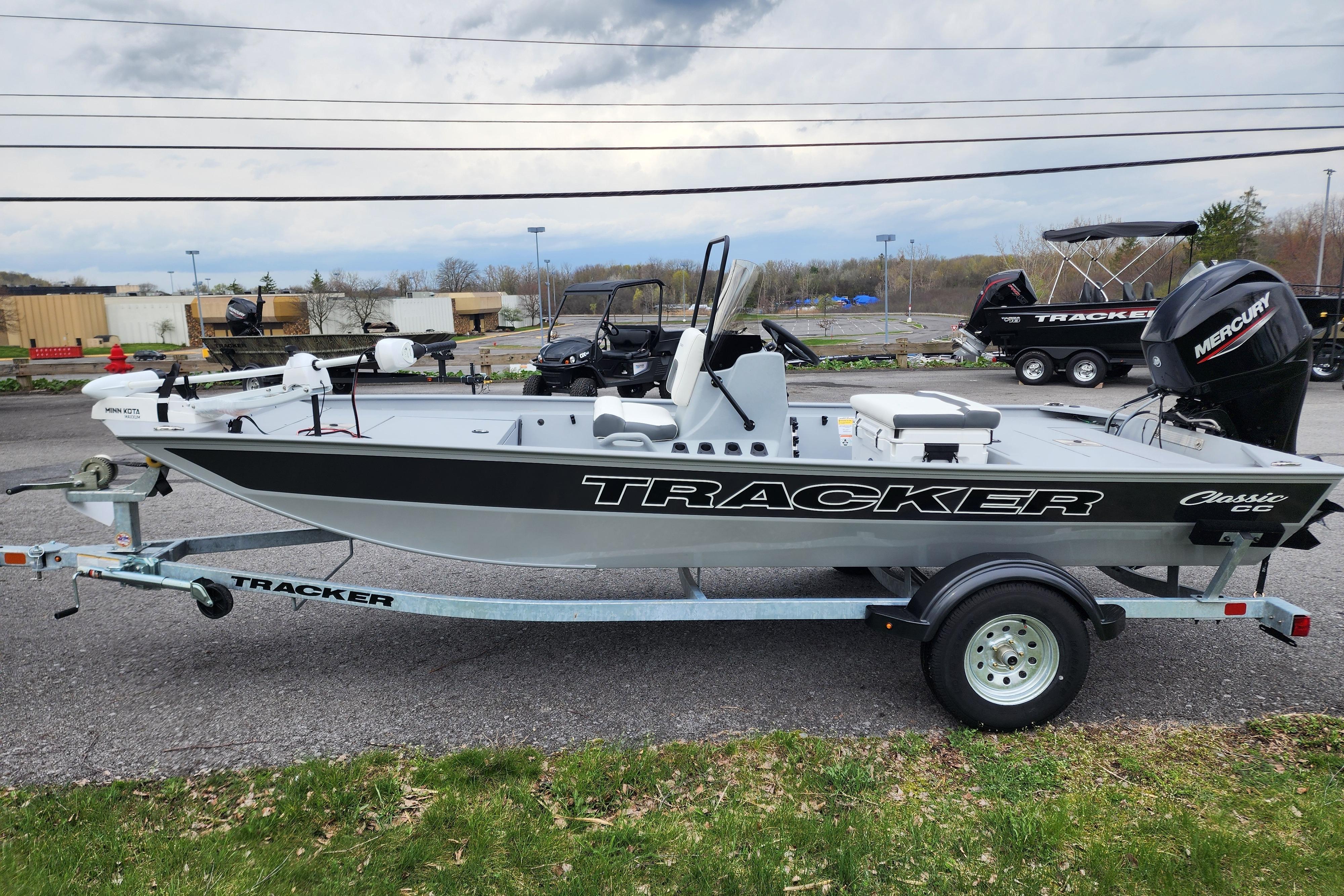 2026 Tracker Bass Tracker Classic CC boat on trailer, parked outdoors.