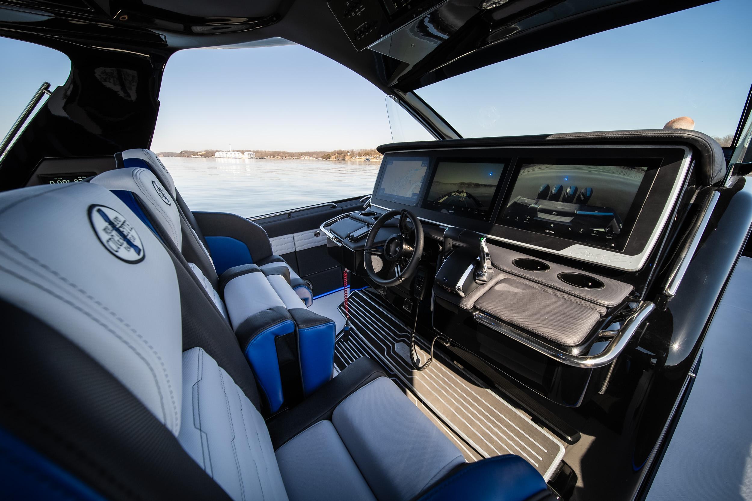 Interior of 2025 Cigarette 42 Auroris boat with modern dashboard and seating.