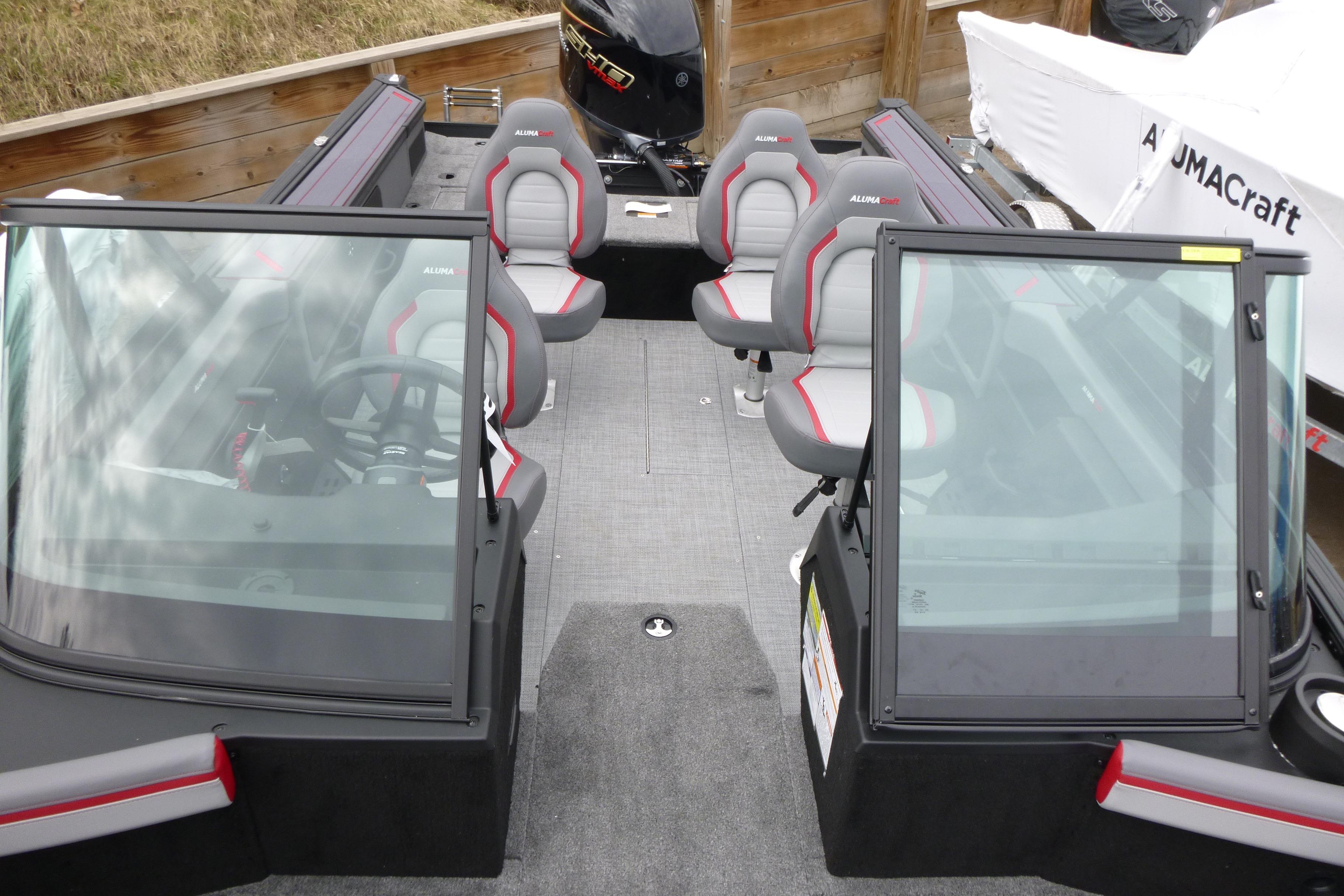 2025 Alumacraft Trophy 185X Sport boat interior with seating and steering wheel.
