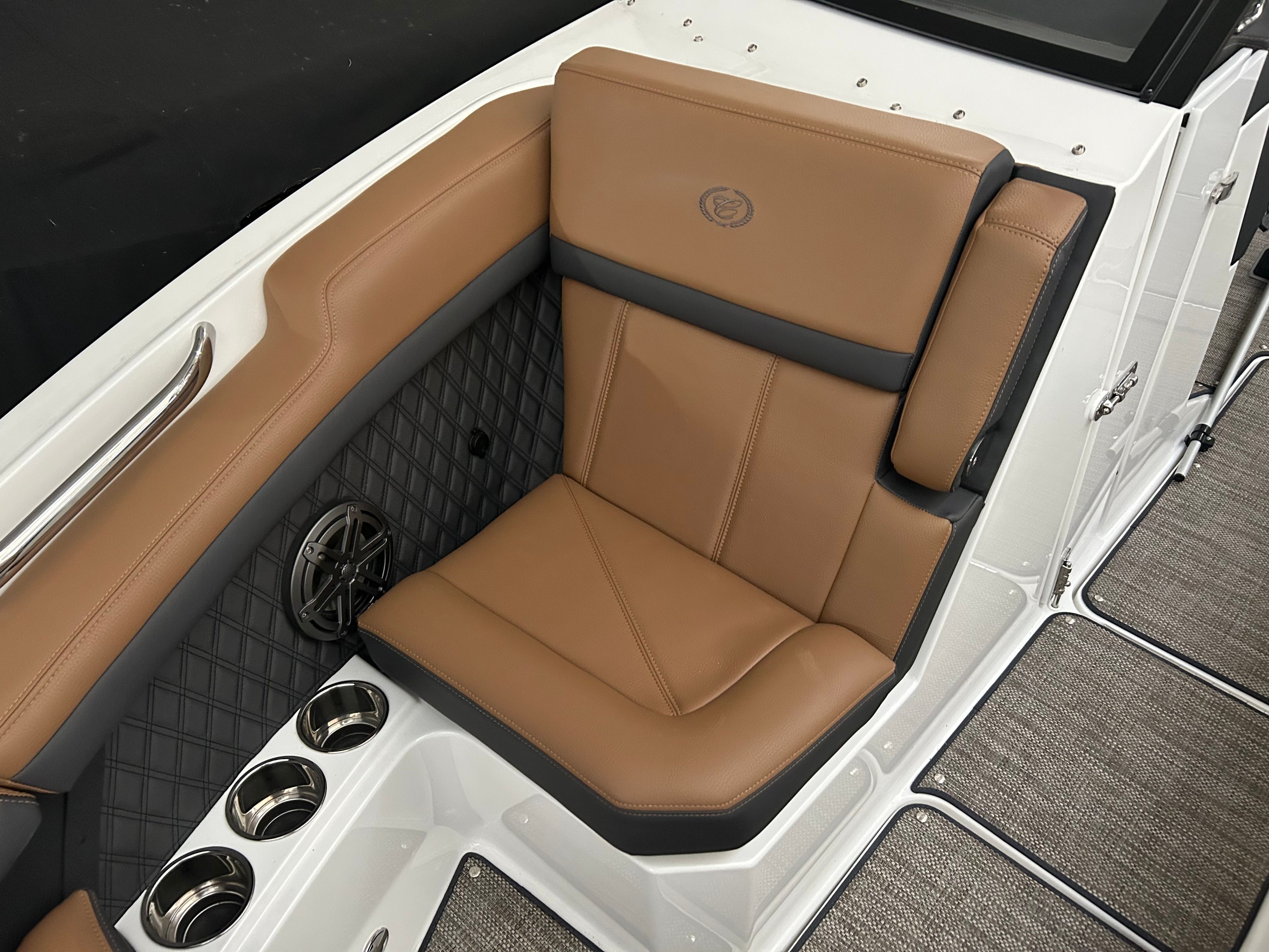 Luxurious seating in 2024 Cobalt R6 boat with brown leather.