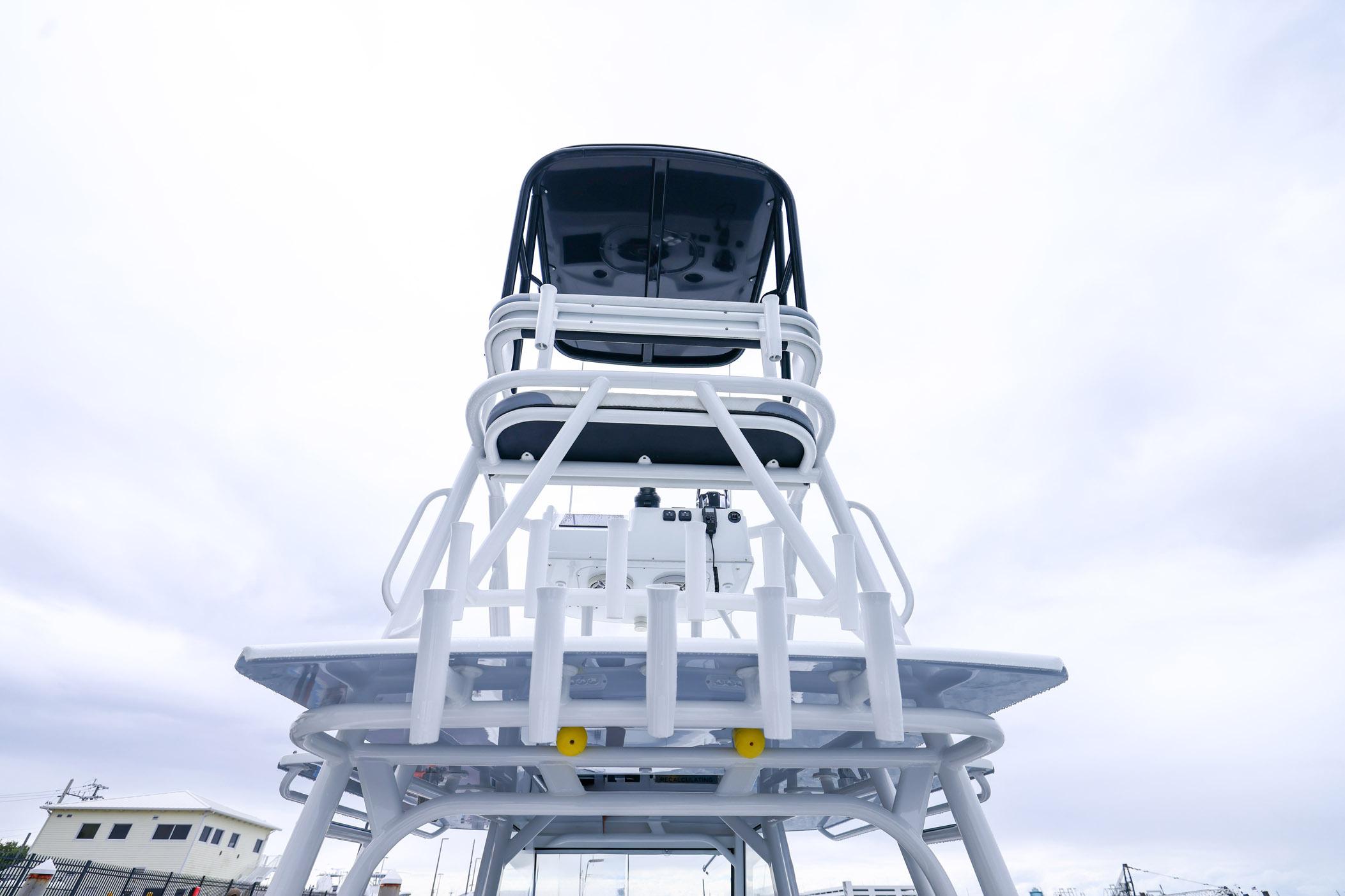2020 Yellowfin 42 Offshore boat tower against cloudy sky, showcasing sleek design.