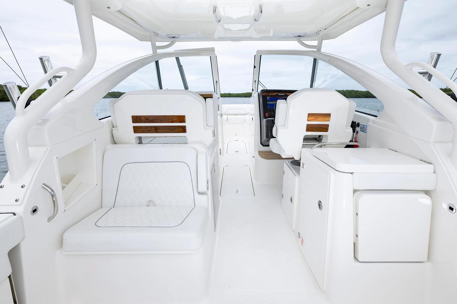 Manufacturer Provided Image: 2026 Pursuit DC 286 Dual Console boat interior with white seating and modern design.