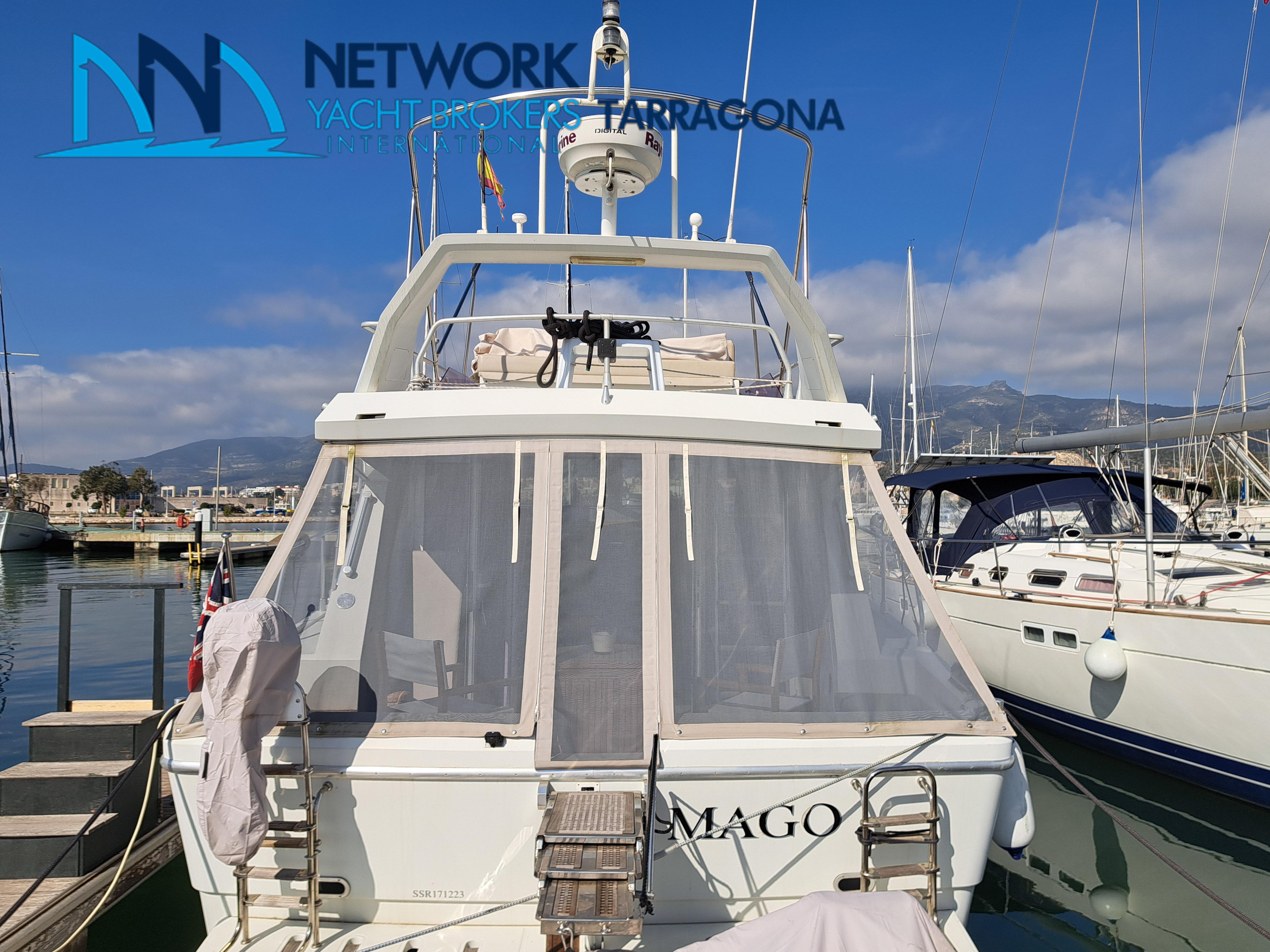 Raffaelli Storm 1989 yacht docked in Tarragona harbor.