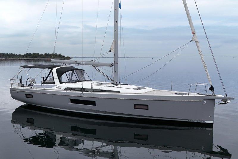 Beneteau Oceanis 51.1 sailboat, 2022 model, on calm water with clear sky.