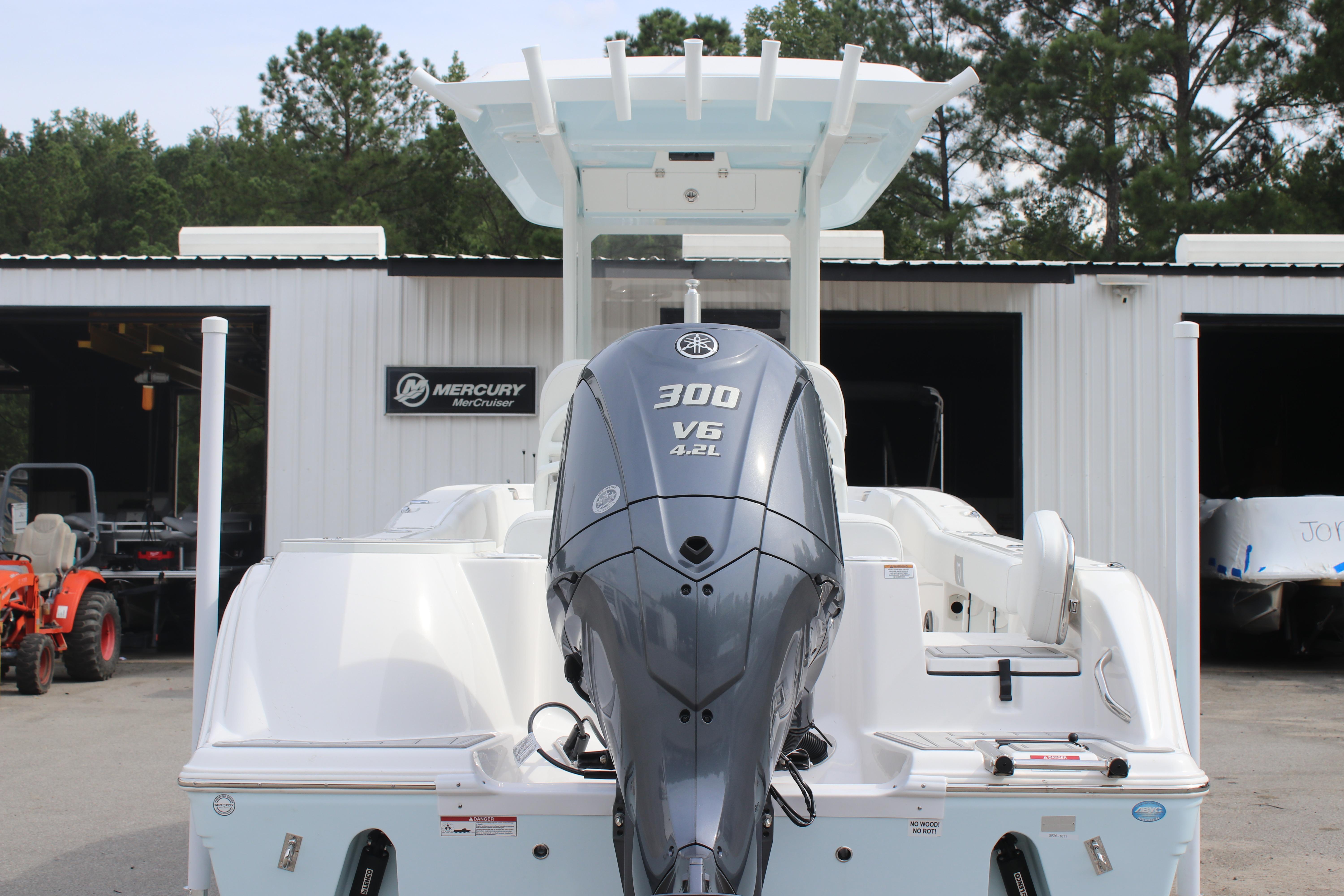 2026 Sea Fox 248 Commander boat with powerful 300 V6 engine at a dealership.