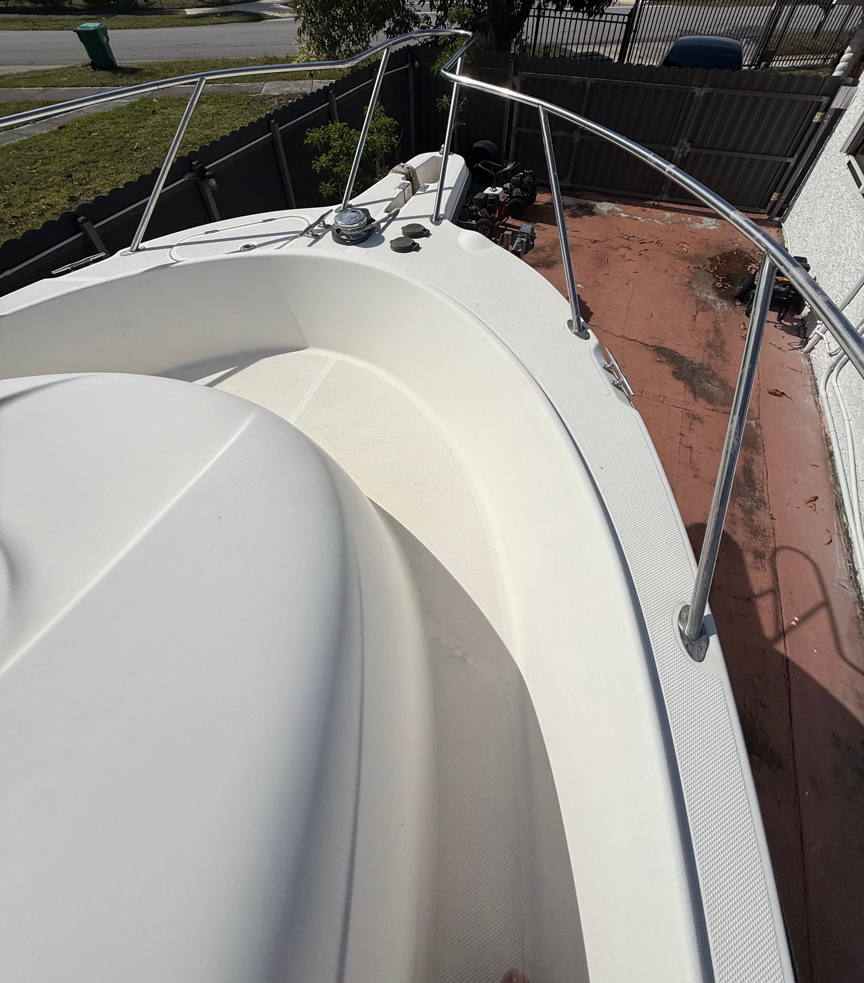 2005 Trophy 2902 Walkaround boat deck with railing.