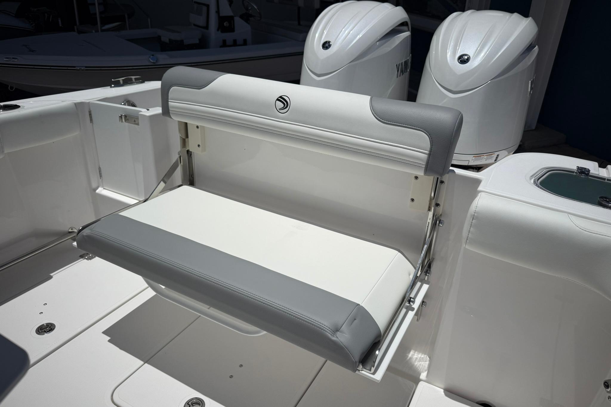 2026 Edgewater 250CC boat with foldable seating and dual Yamaha engines.