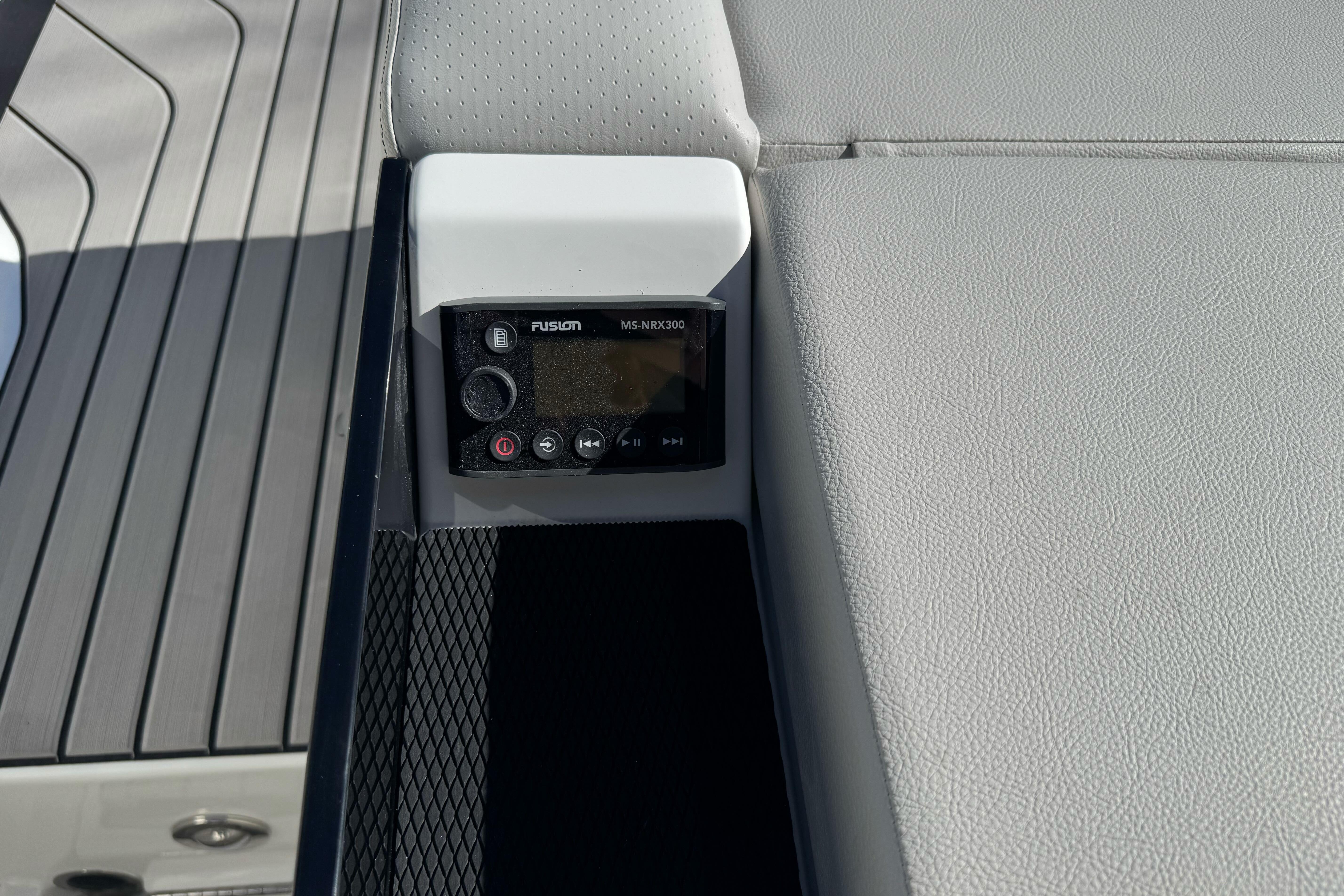 2026 Sea Ray SLX 260 boat interior with Fusion MS-NRX300 audio control panel.
