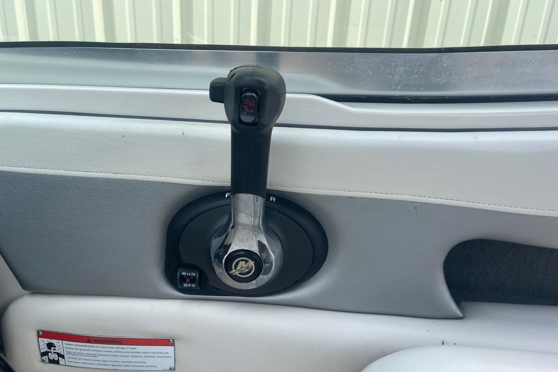 Throttle control lever on a 2010 Sea Ray 230 Bow Rider Select boat.