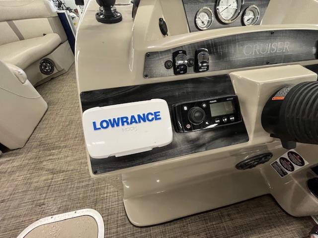 Control panel of a 2020 Harris Cruiser 210 boat with Lowrance navigation system.