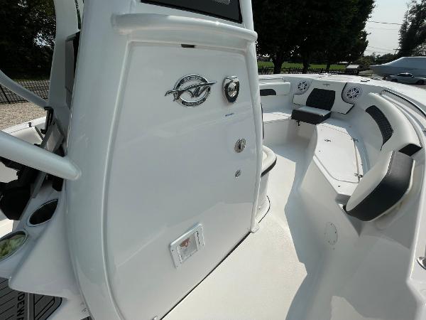2025 Tidewater 232 CC Adventure boat interior with seating and control panel.