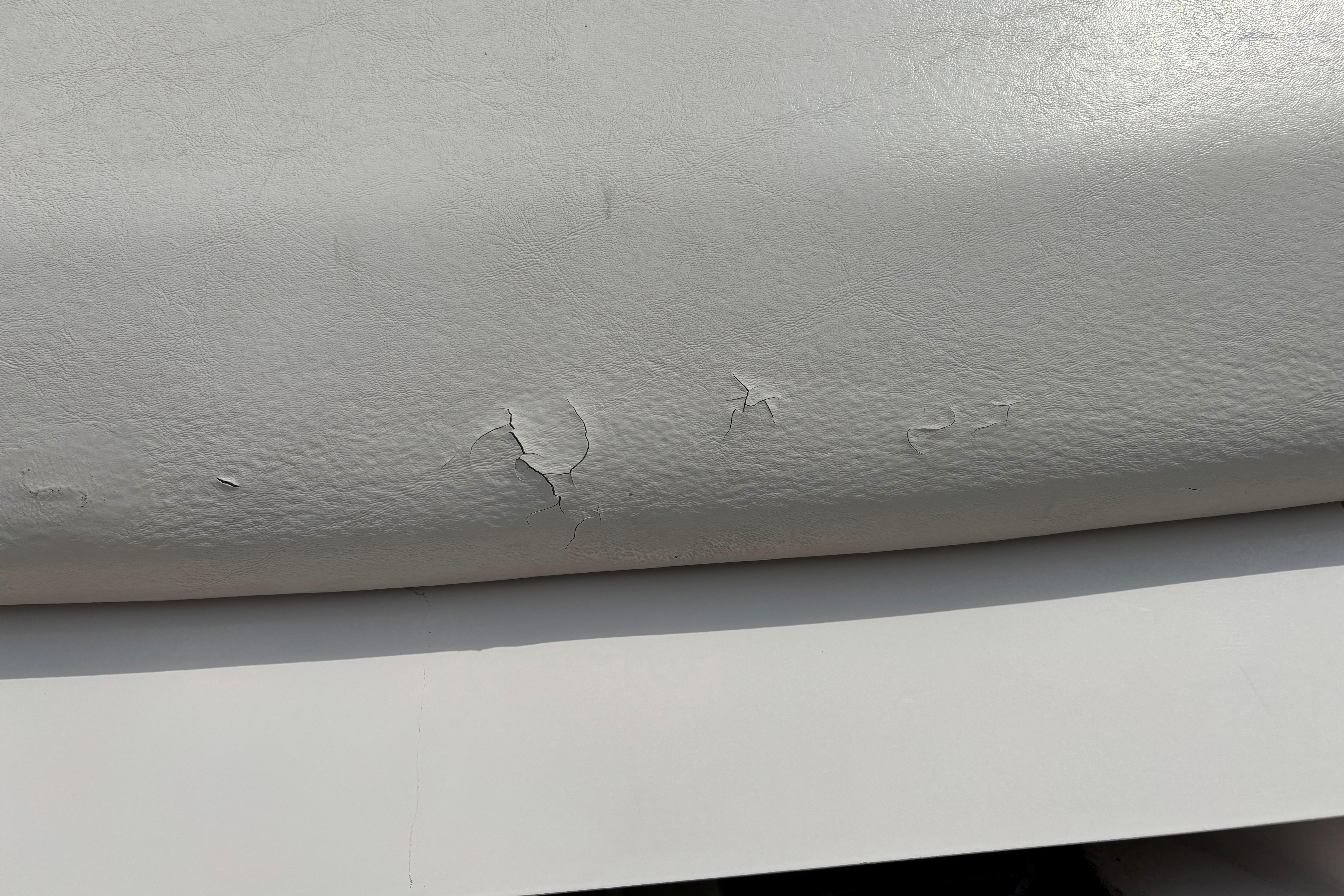 Cracked upholstery on 1999 MasterCraft 205 PRO STAR boat seat.