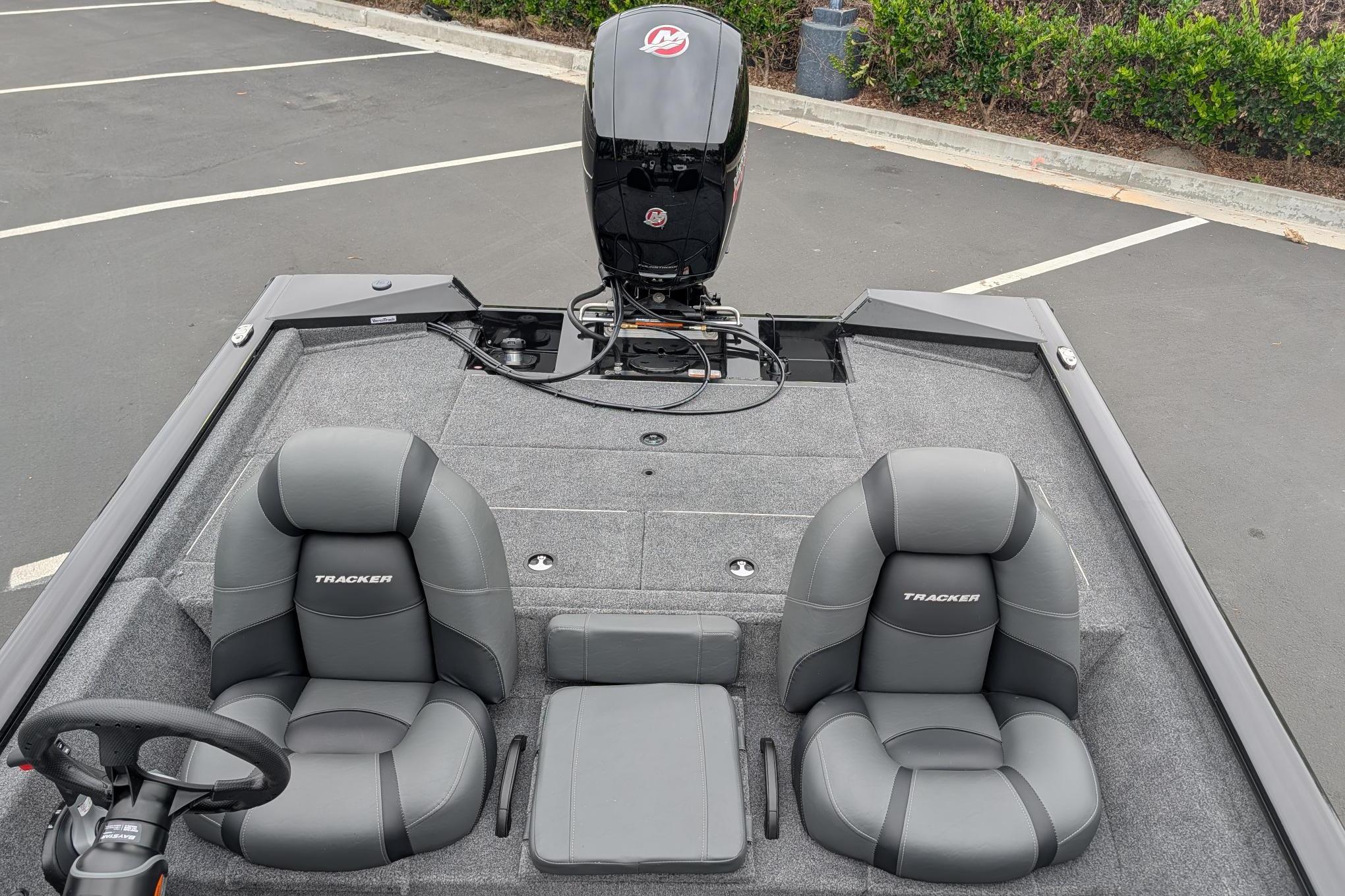 2026 Tracker Pro Team 195 boat interior with dual seats and steering wheel.
