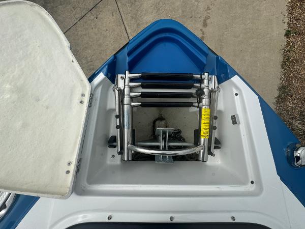 2018 Monterey 258 Super Sport boat ladder and anchor compartment.