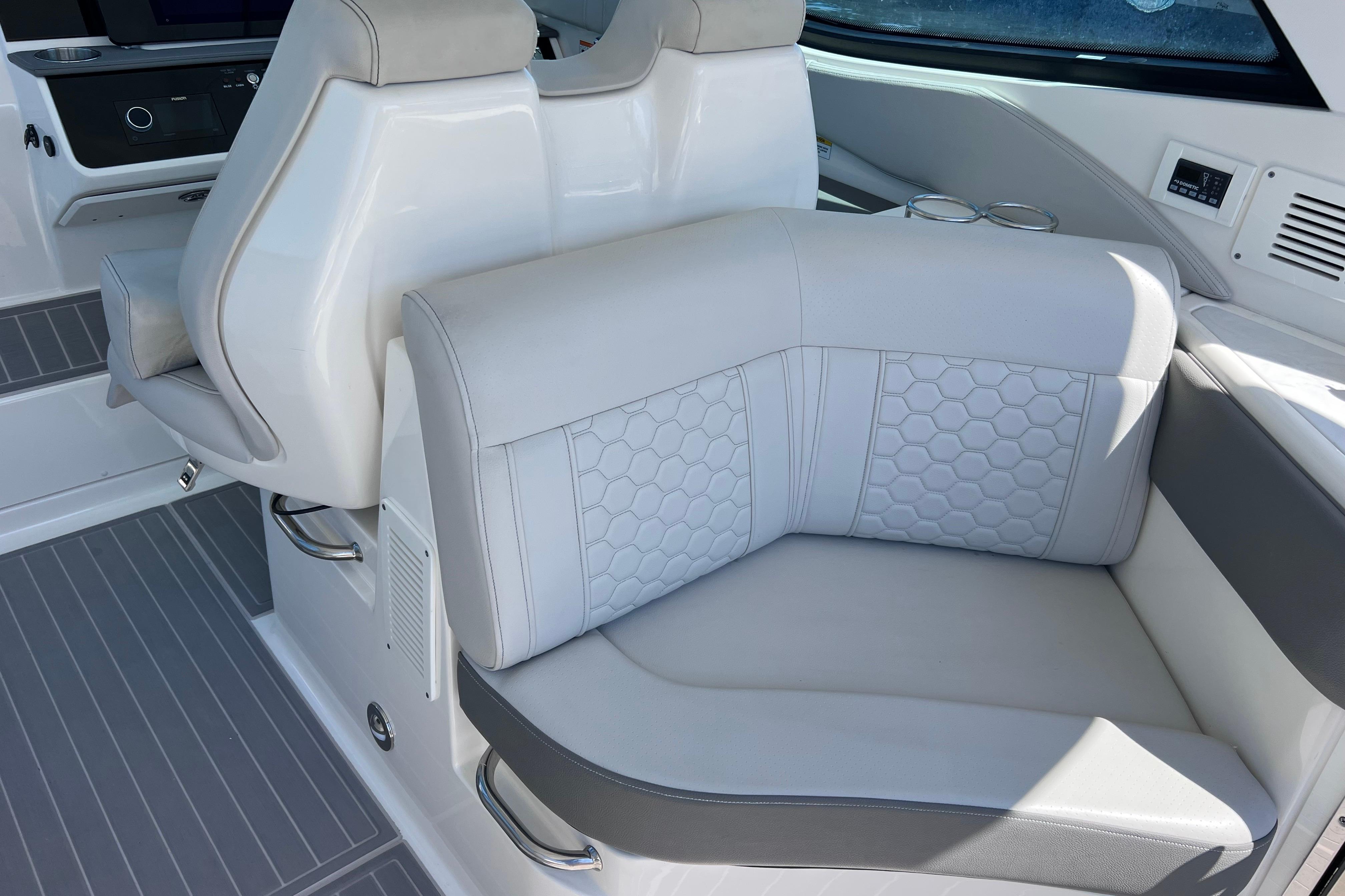 Luxurious seating on 2022 Sea Ray Sundancer 320 Coupe Outboard, featuring modern design and comfort.